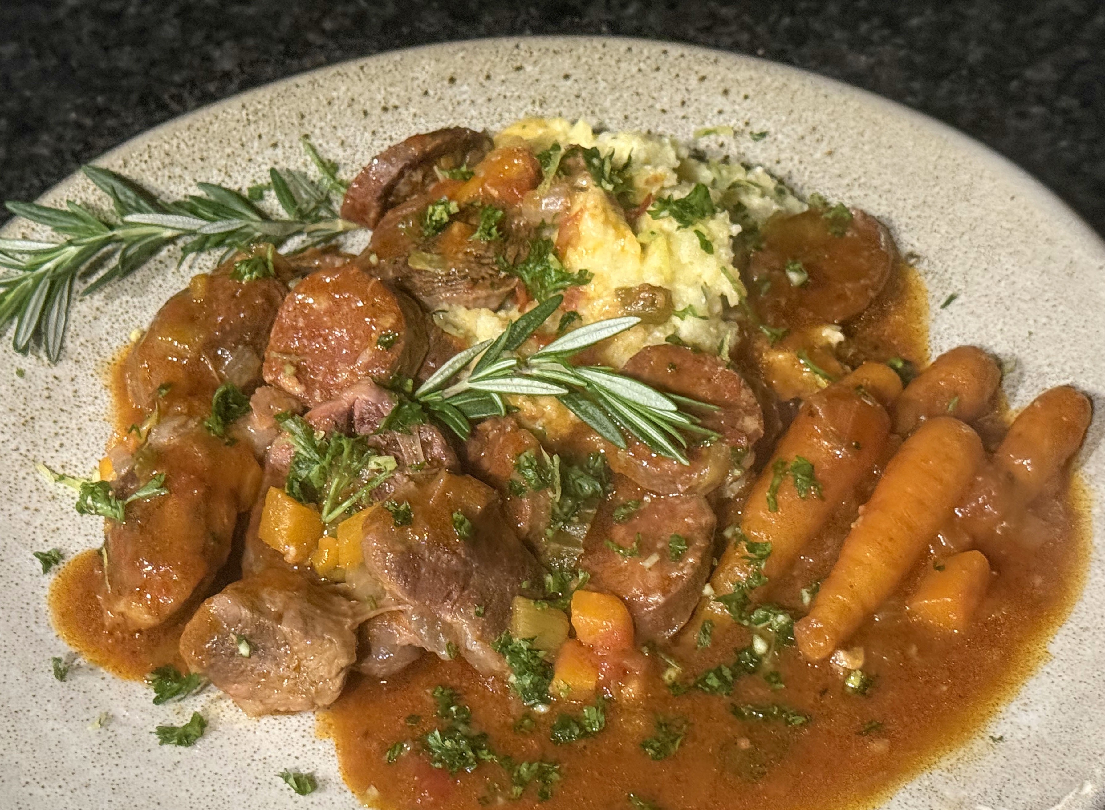 Beef shin and bone marrow stew with chorizo, orange and gremolata
