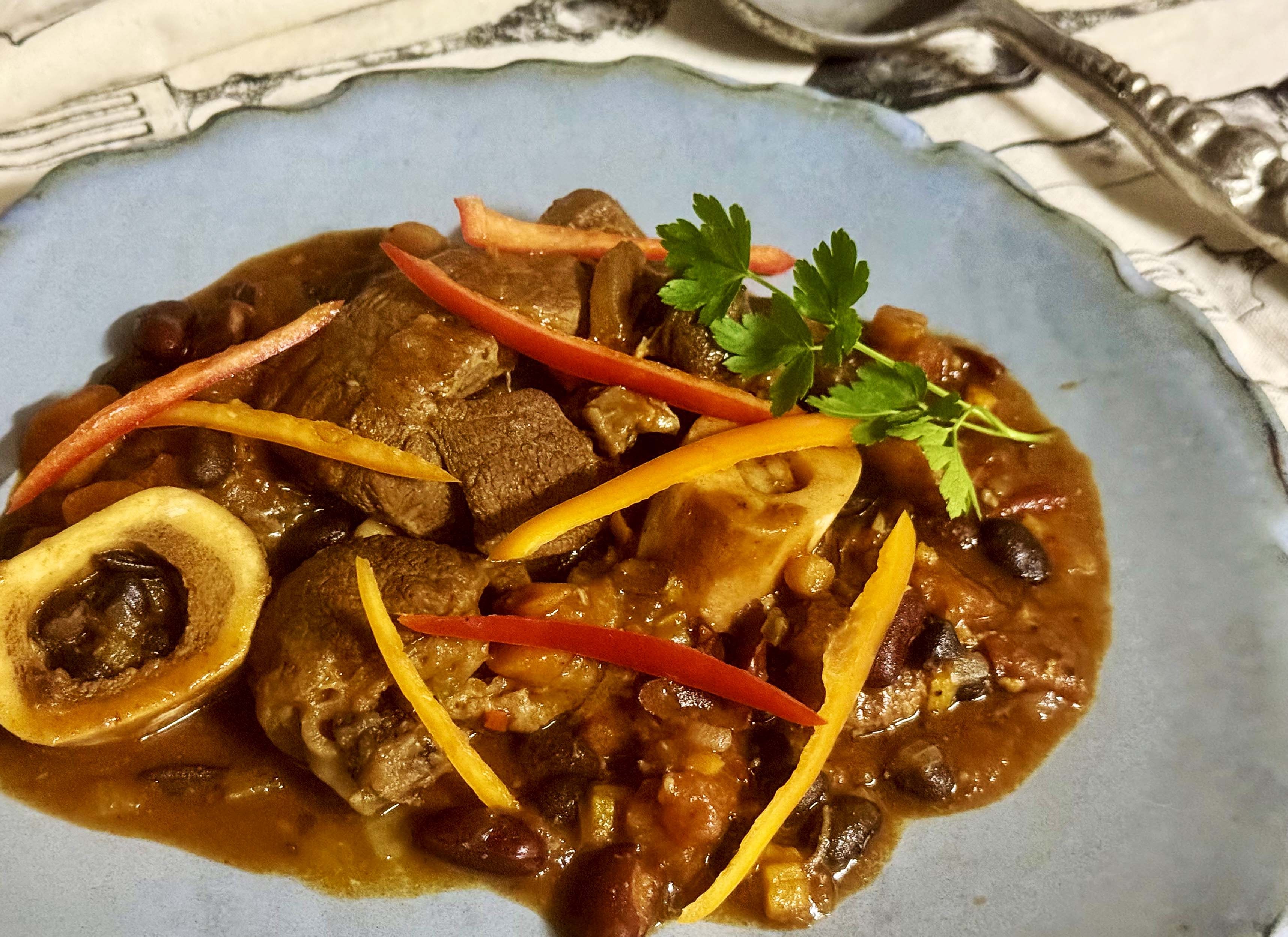 Beef shin stew with pimentón, beans and sweet peppers