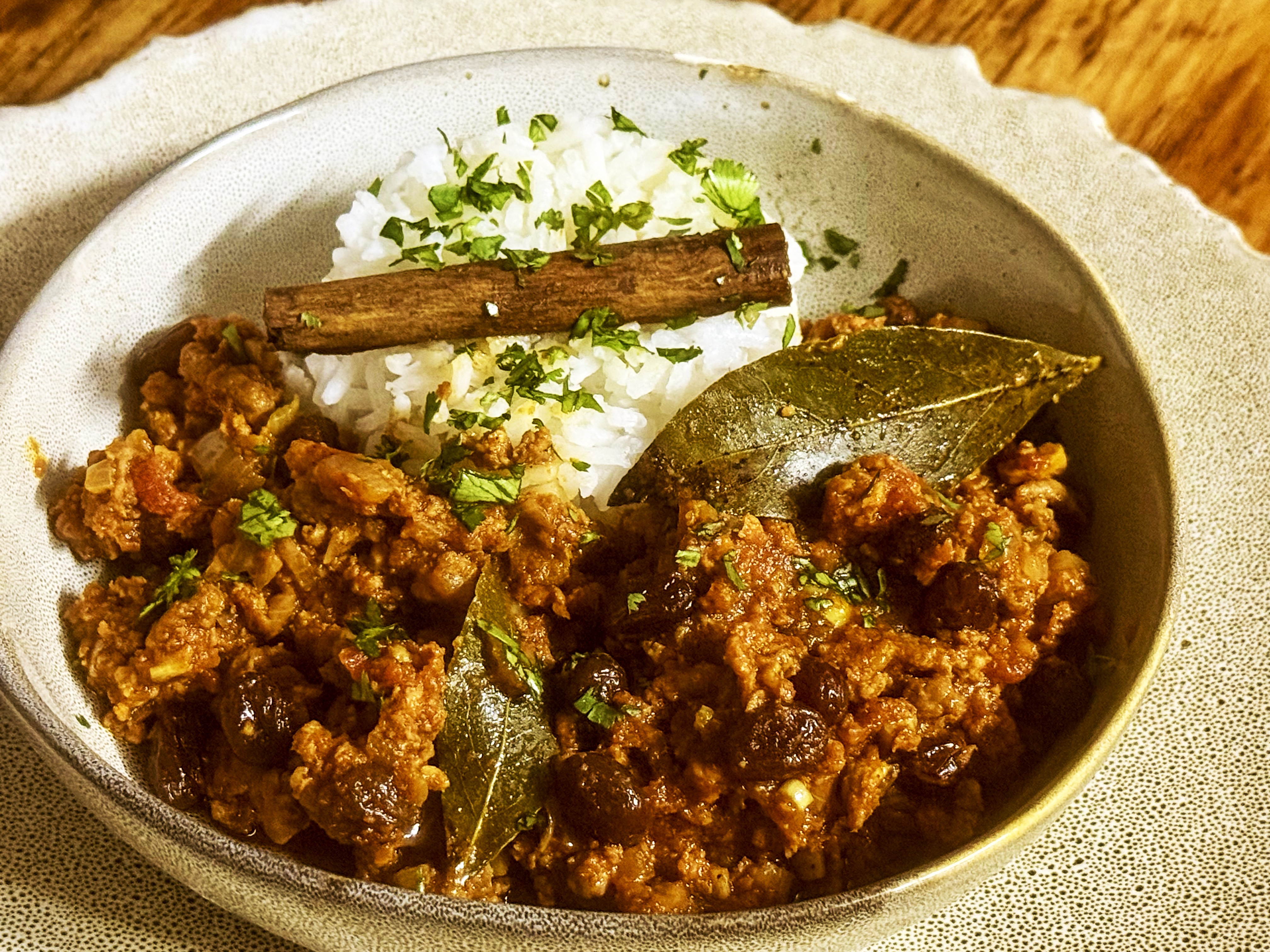 Curried beef mince with fresh turmeric and raisins