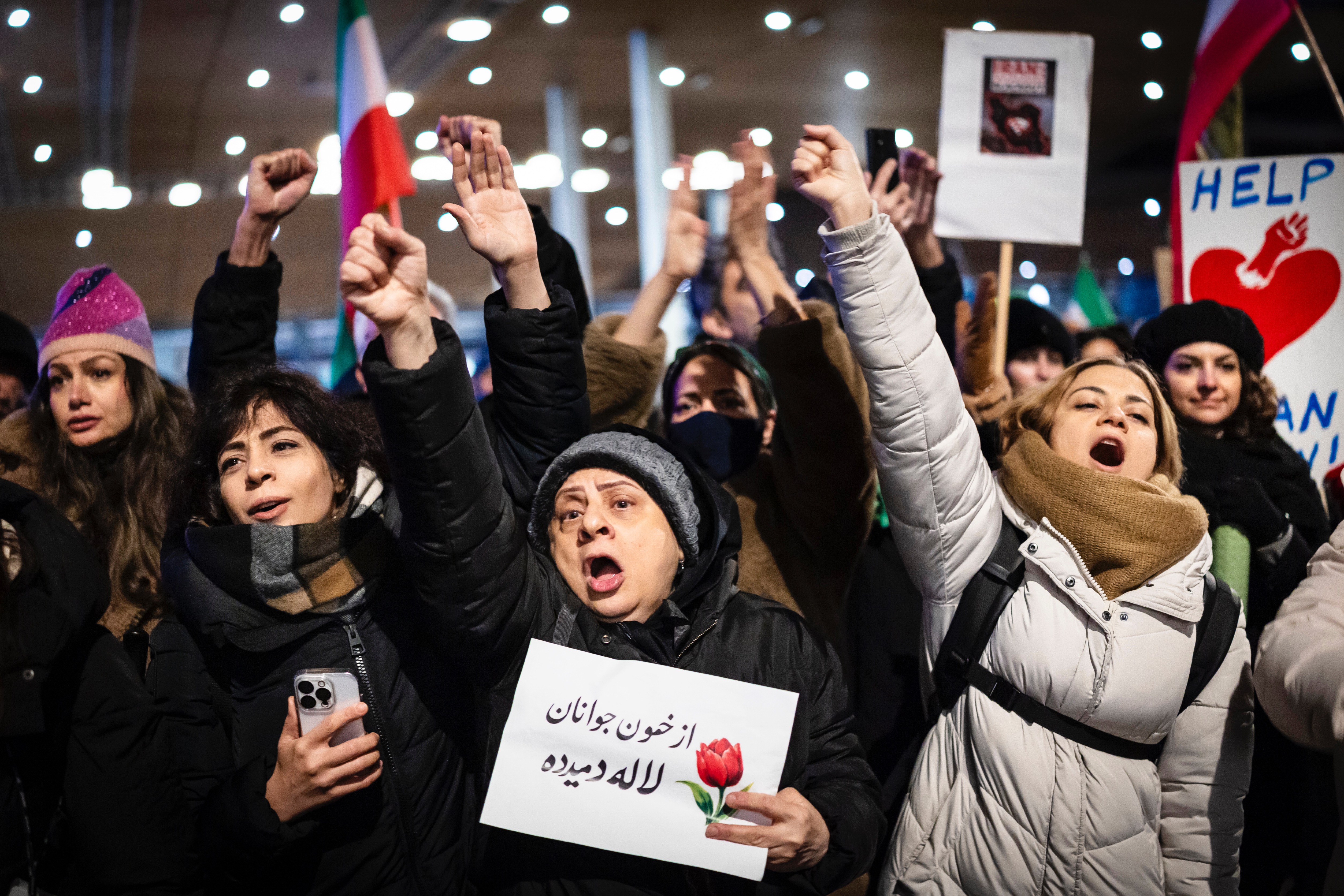 Protesters attend a rally in support of the nationwide mass demonstrations in Iran against the government, in Zuerich, Switzerland, 13 January 2026. Nationwide anti-government protests, triggered by economic crisis and political repression, have taken place across Iran since late December 2025, despite a heavy crackdown. EPA/MICHAEL BUHOLZER
