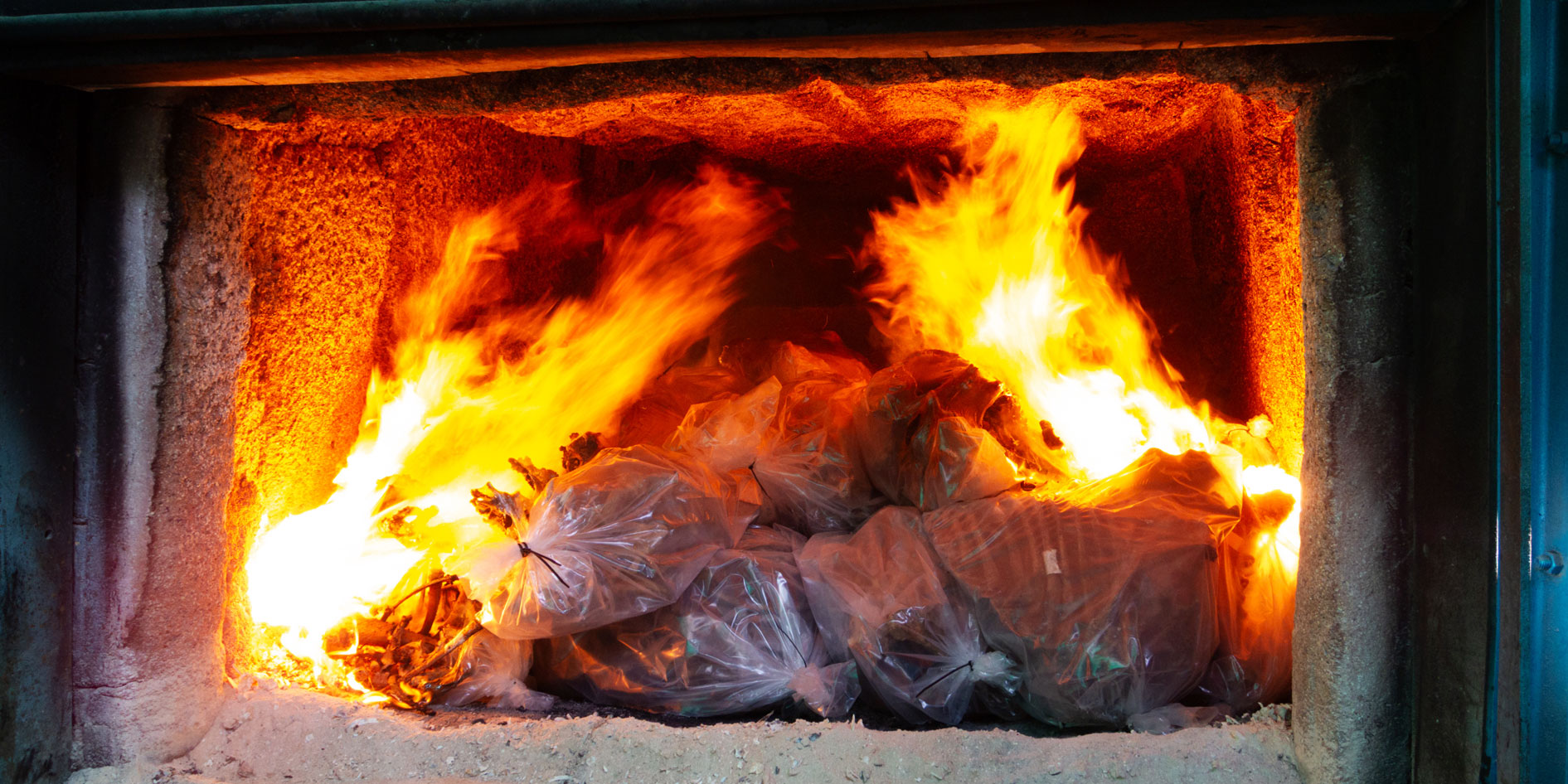 Incinerator flames begin turning the bones of 42 lions to ashes. (Photo: Don Pinnock) 