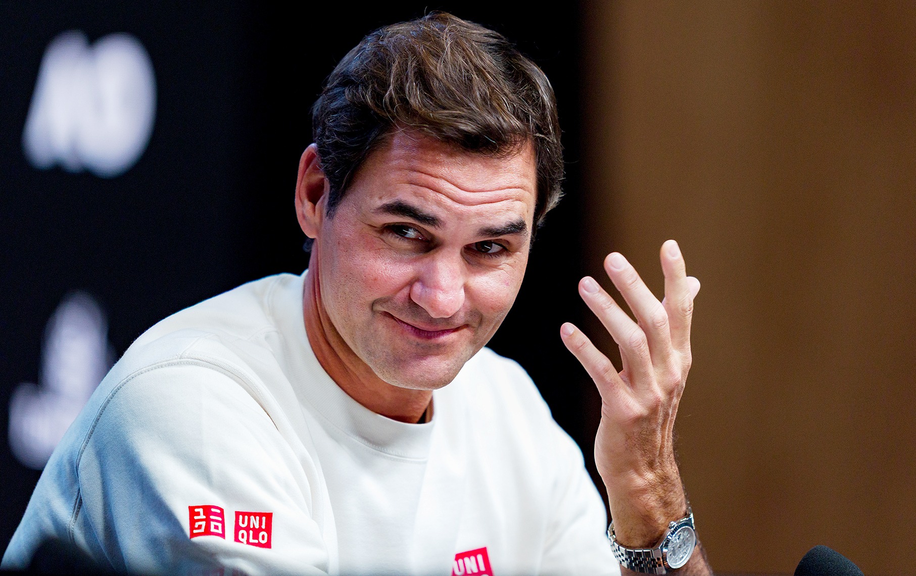 Roger Federer of Switzerland talks to the media at a press conference ahead of the 2026 Australian Open. (Photo: Kelly Defina / Getty Images)