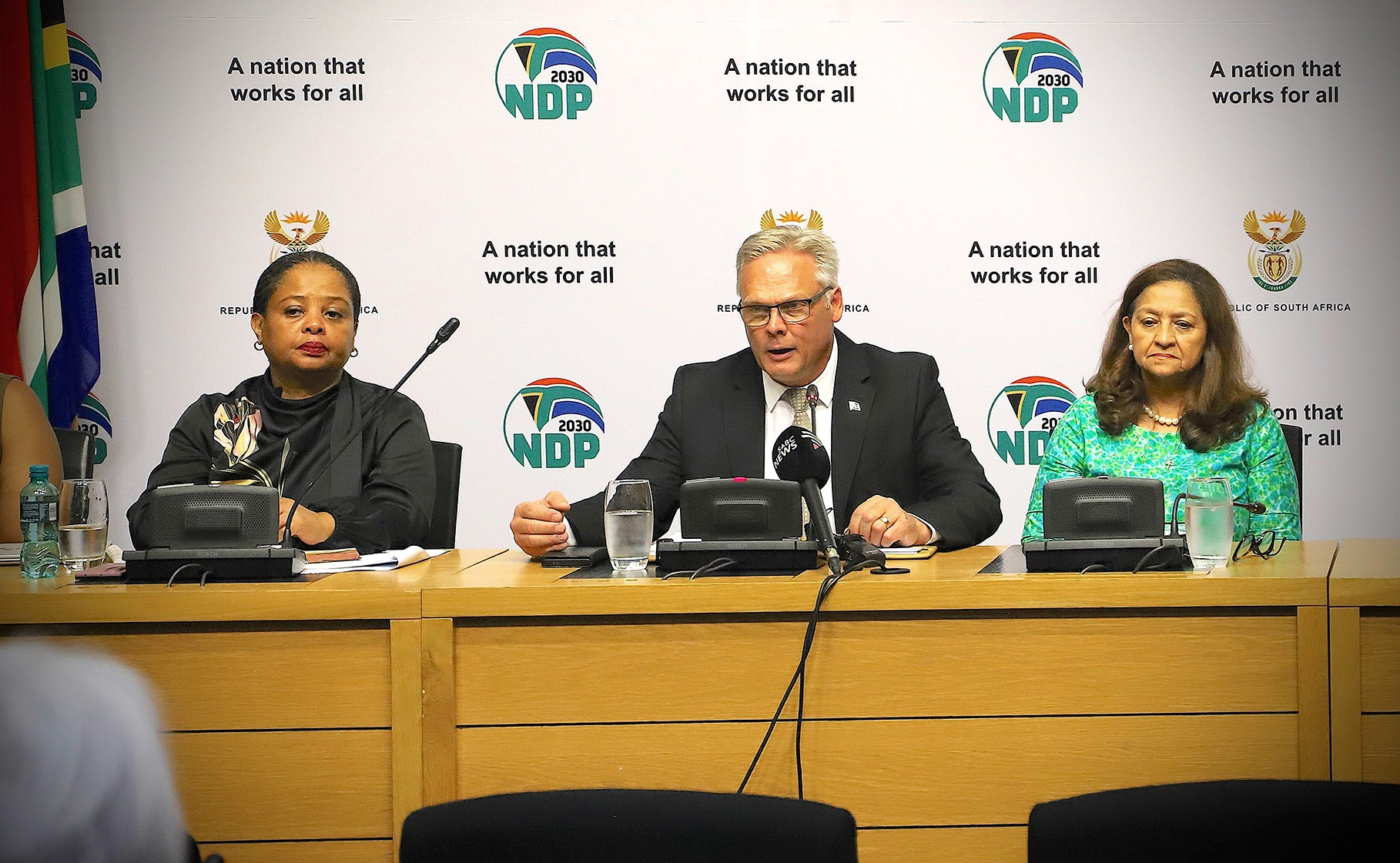 From left: SANParks CEO Hapiloe Sello, Minister Willie Aucamp and SANParks board member Beryl Ferguson address the media at Parliament, Cape Town, about the floods in Kruger National Park, 22 January 2026. (Photo: Department of Forestry, Fisheries and the Environment)