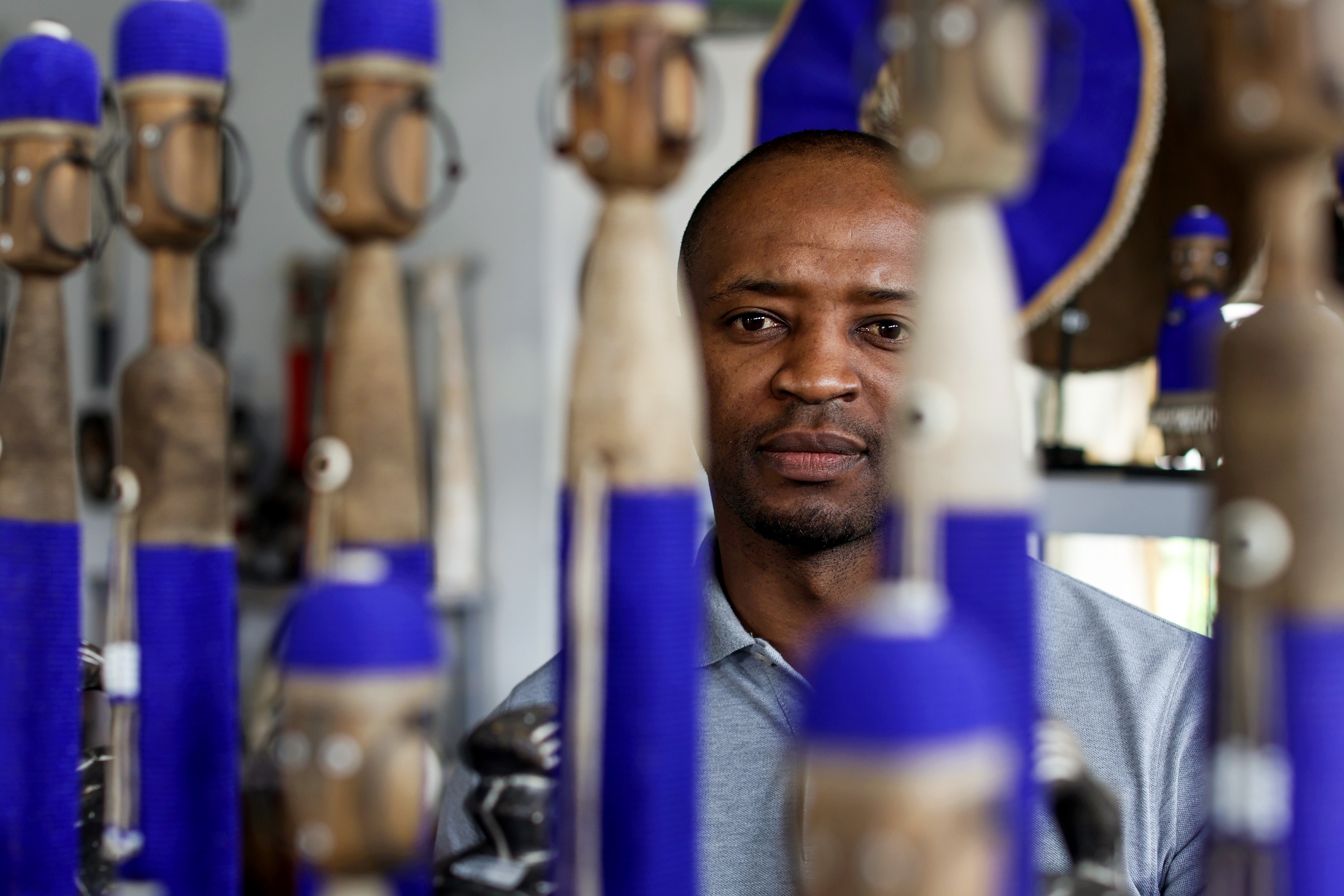 Ali Ntieche poses for a portrait inside his shop at the Victoria Yards in Johannesburg. (Photo: Our City News / James Oatway