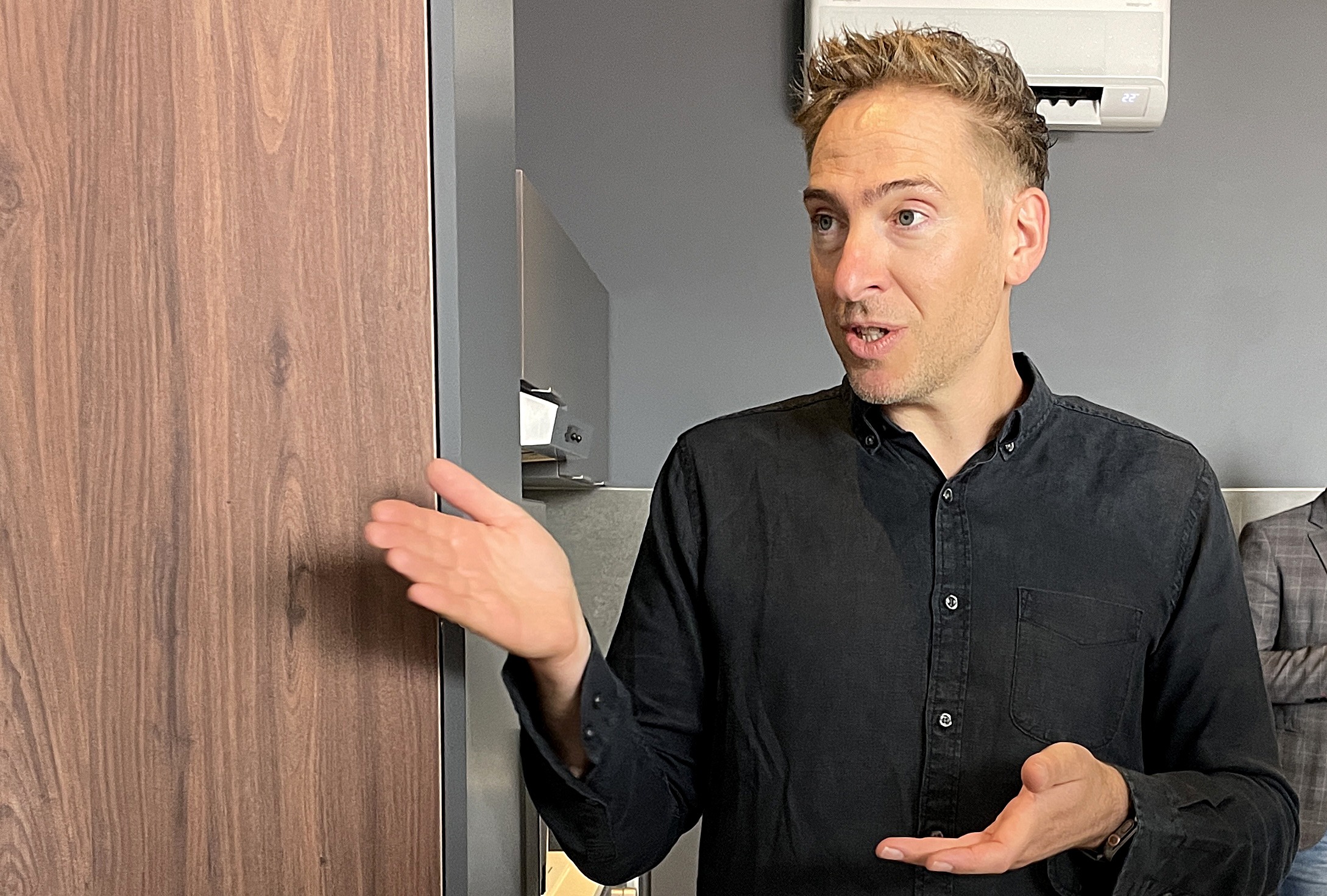Marc Wachsberger, the founder and CEO of The Capital Hotels, Apartments and Resorts, shows an apartment during the opening of The Capital Boardwalk on 16 April. (Photo: Kyran Blaauw) 