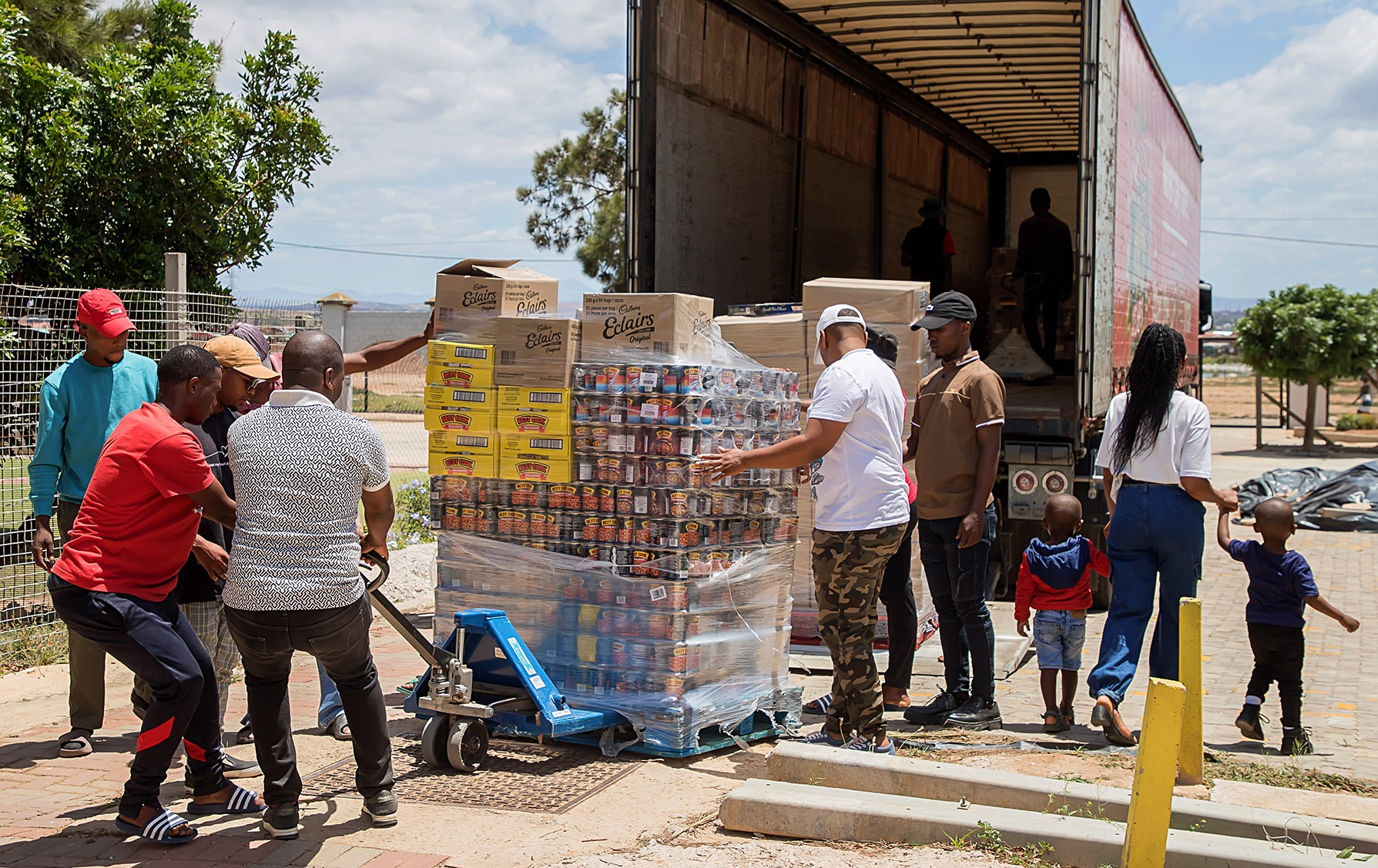 Daily Maverick and SA Harvest teamed up once again to provide communities in need with ‘Buckets of Nutrition’, food that will last families until their children return to school and can access school nutrition programmes again. (Photo: Donna van der Watt)