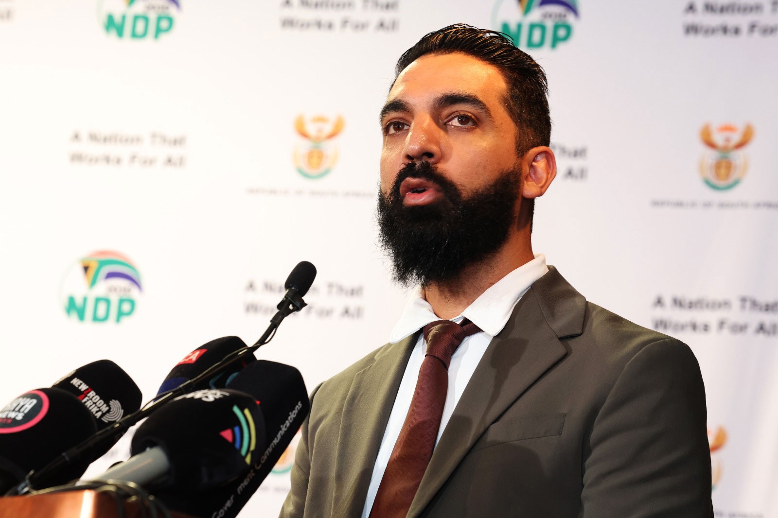 NSFAS Acting CEO Waseem Carrim briefs the media on NSFAS’ comprehensive preparations for the 2026 academic year, with a focus on funding disbursements and registration support for all universities and TVET colleges. (Photo: GCIS / Kopano)