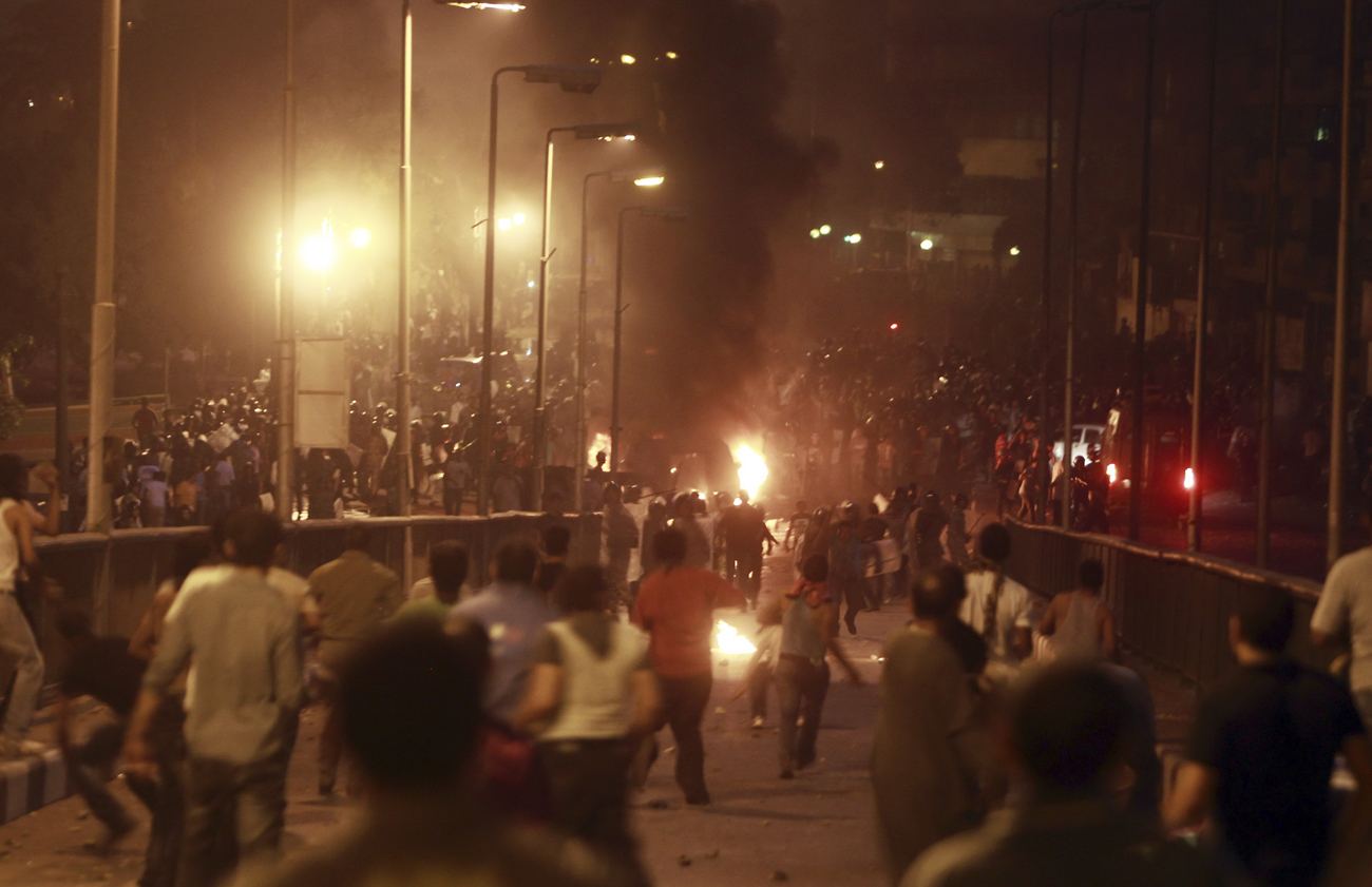 Deadly clashes erupt between protesters and ruling military junta in Cairo