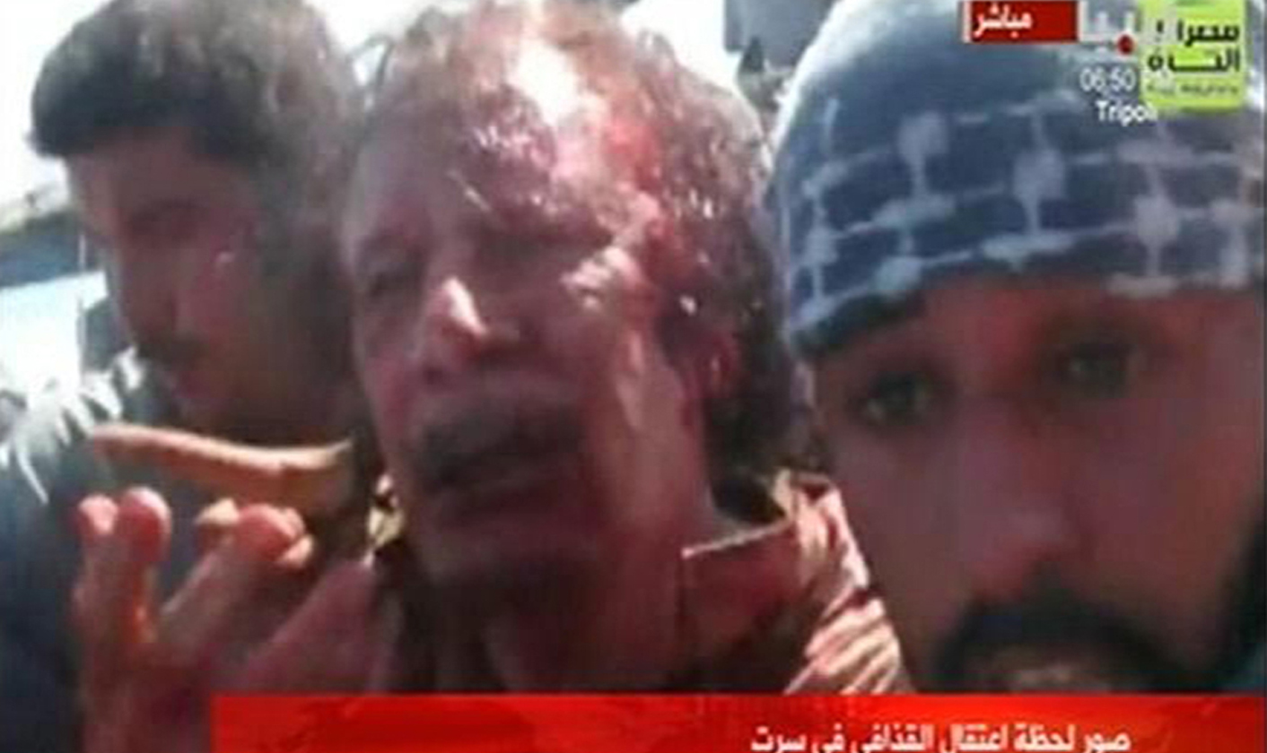 In death as in life, Colonel Gaddafi wins the crazy prize