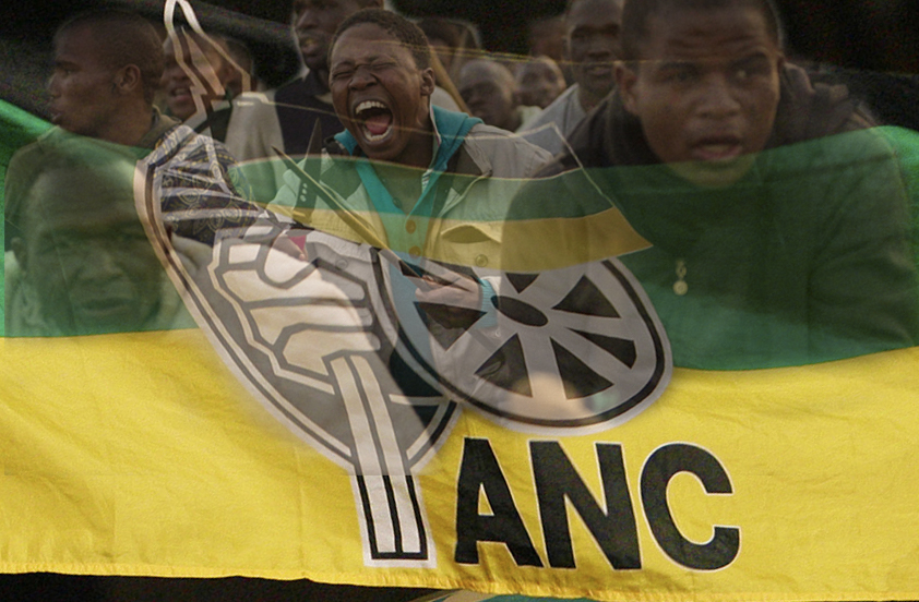 African National Congress supporters carry a flag during their celebration in Johannesburg