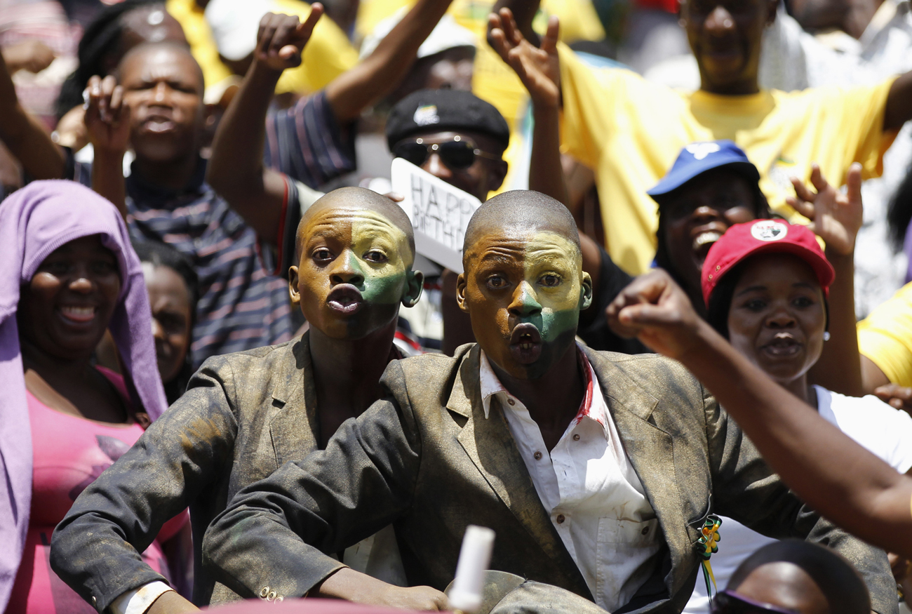 ANC supporters dance during the ANC's centenary celebration in Bloemfontein