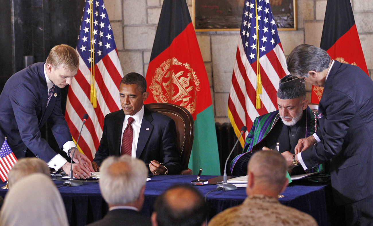 Iran queries Obama's pact with Karzai