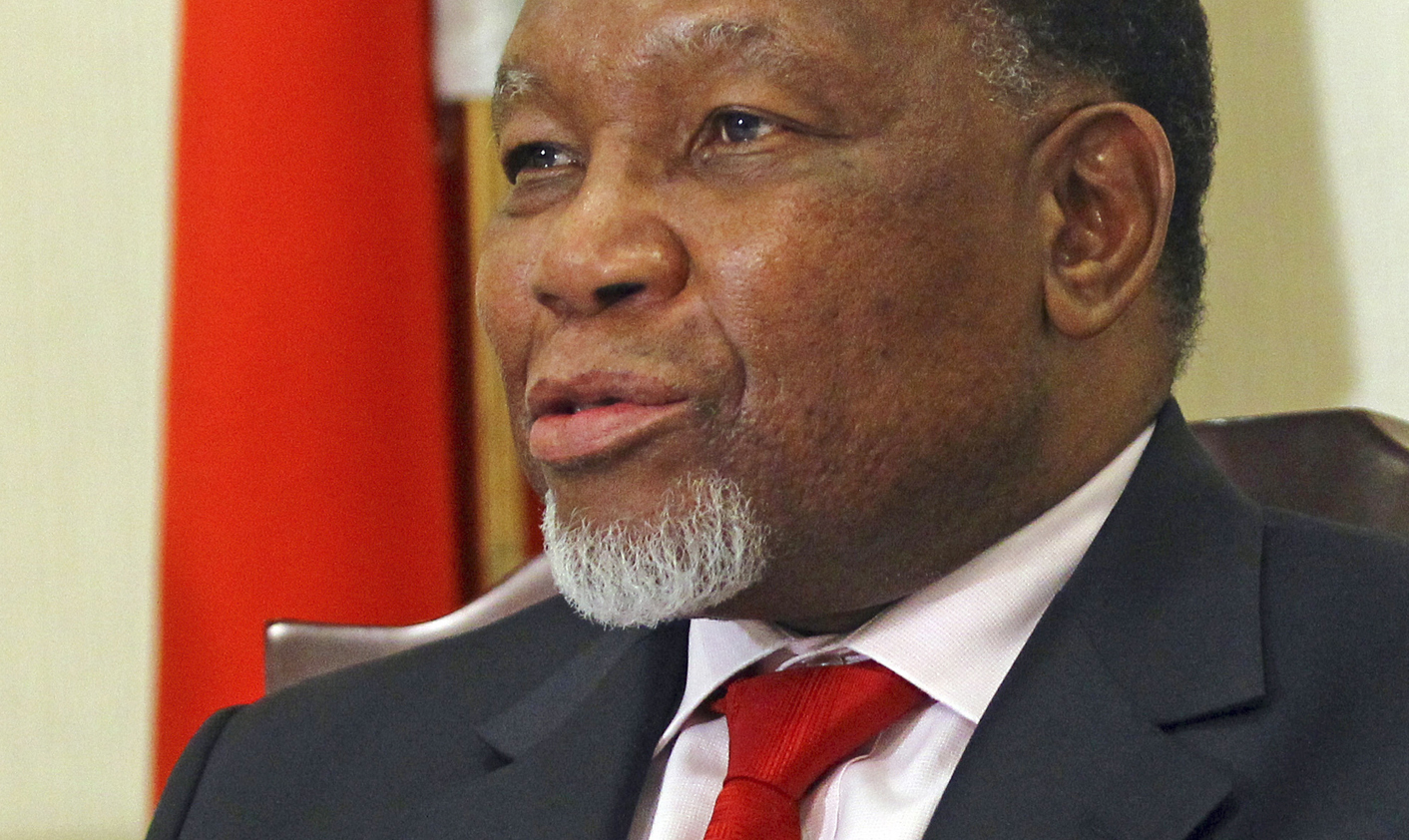 South Africa's Deputy President Kgalema Motlanthe gestures during a news conference in Beijing