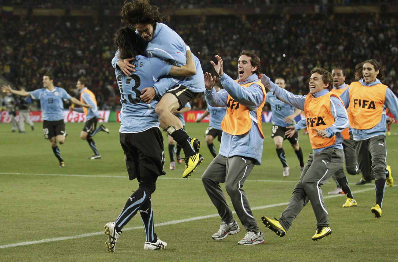 Uruguay come back from dead, wrest penalty lottery from Ghana