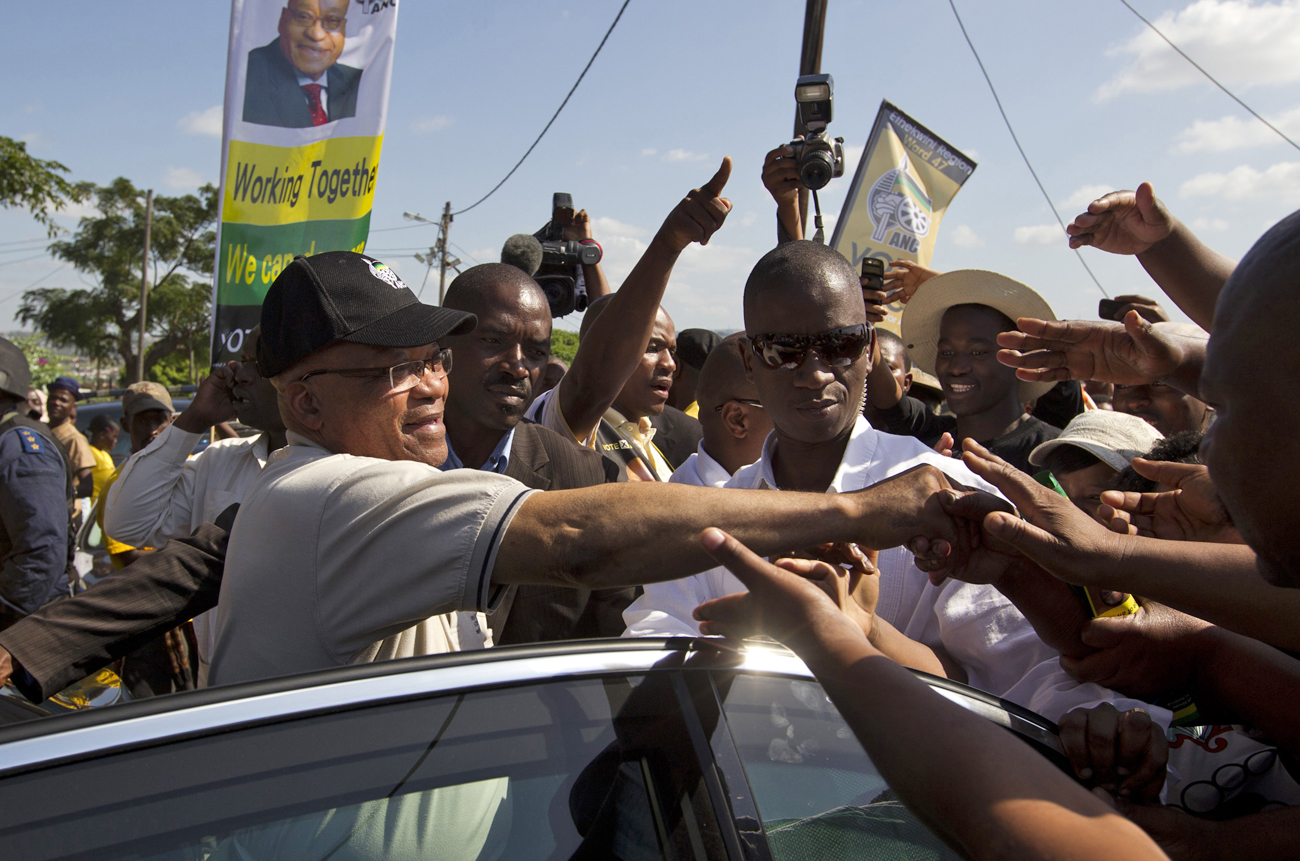 South African President Zuma greets supporters as he campaigns in KwaMashu