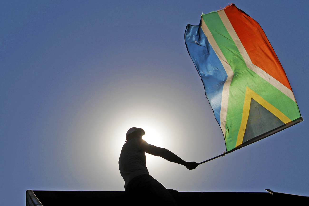 Supporter of "Bafana Bafana" celebrates on the streets of Sandton