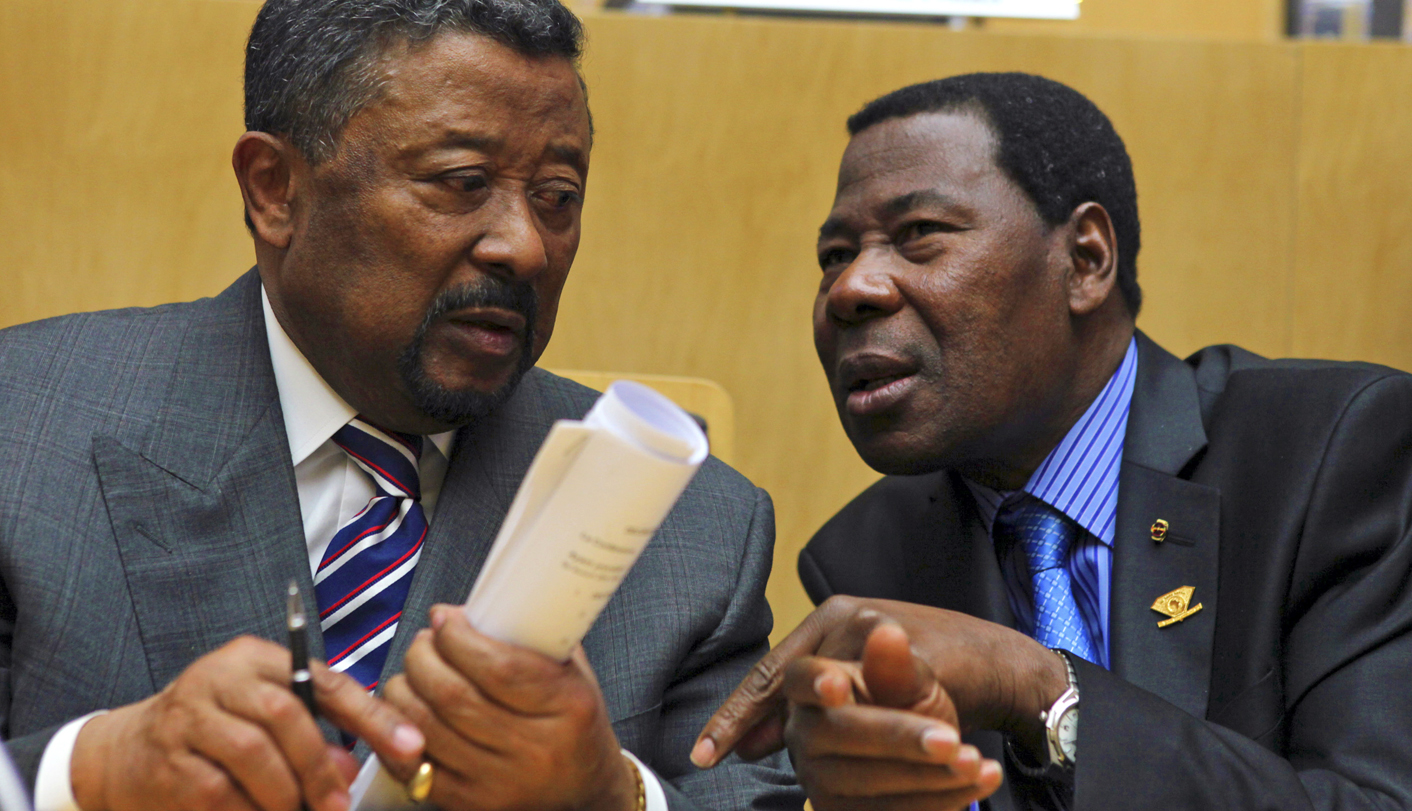 AU Commission Chairman Jean Ping and Benin's President Thomas Boni Yayi, newly elected African Union president, talk shortly after the closing ceremony of the 18th African Union summit in Addis Ababa