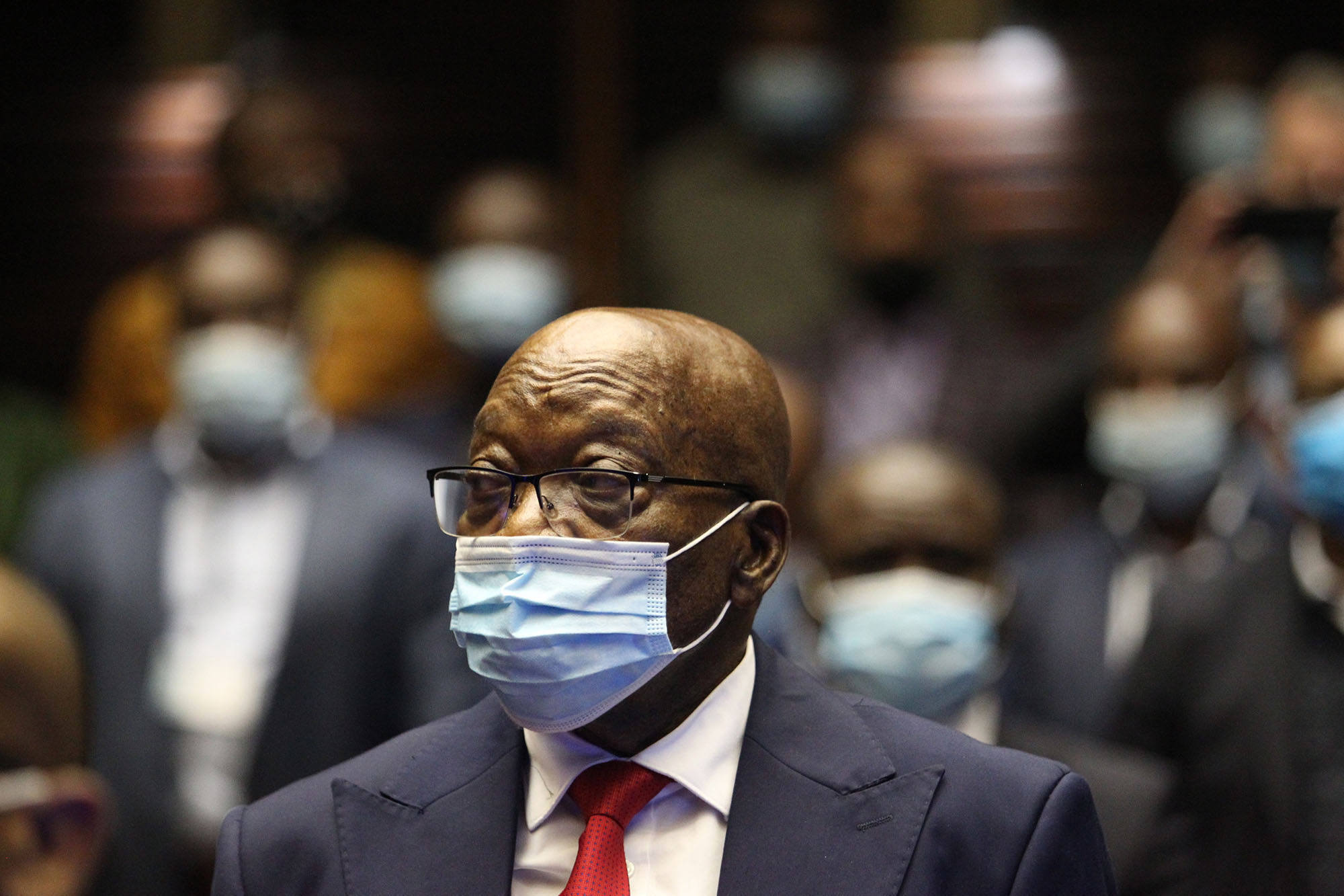 After 10 years (and a staring match with the judge) Zuma finally enters his plea on corruption charges: 'Not guilty'