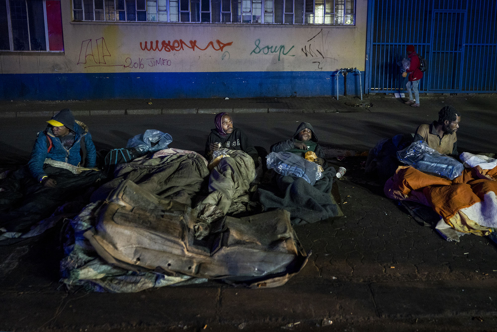 Blanket relief for homeless who shiver under plastic coverings during winter
