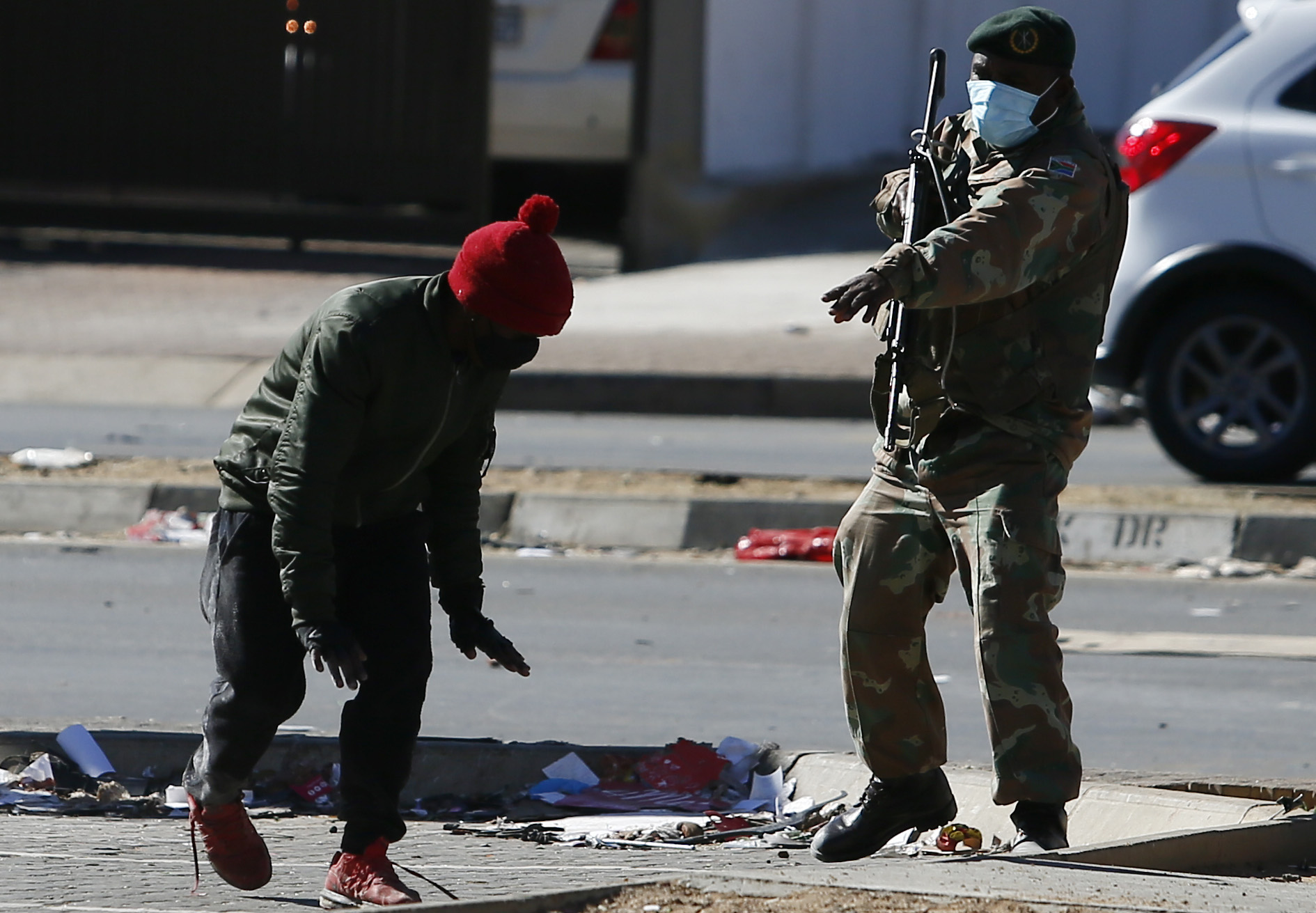 Death toll rising, troops on the ground as looting and burnings continue on Tuesday