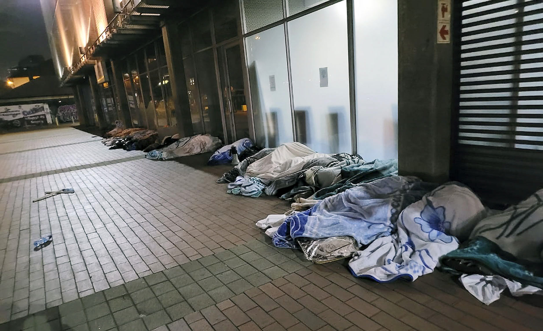 Treatment Action Campaign members spend night outside Gauteng Premier’s office in protest over collapsing healthcare system