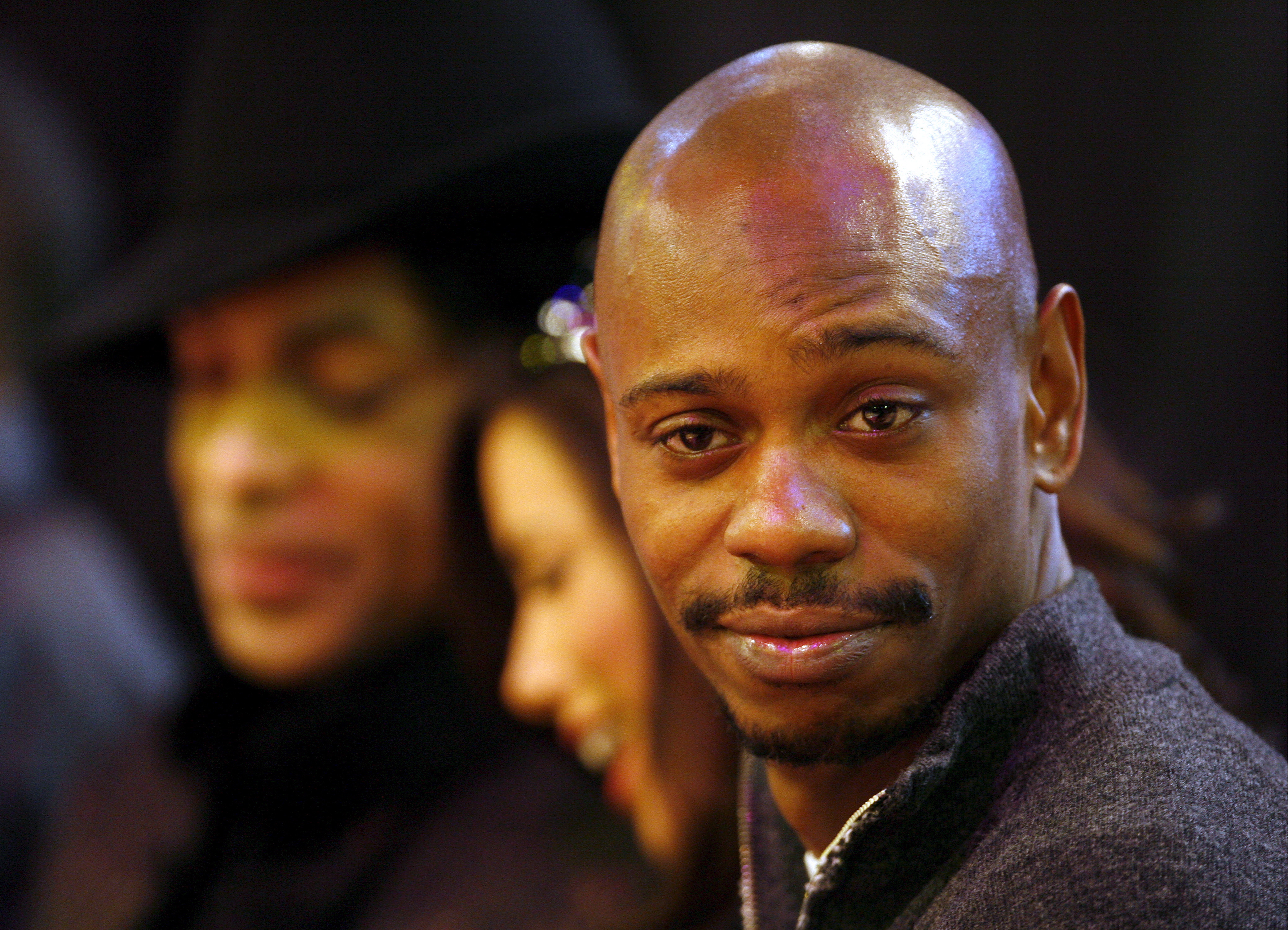 Celebrities enjoy the NBA All-Star game from their courtside seats.