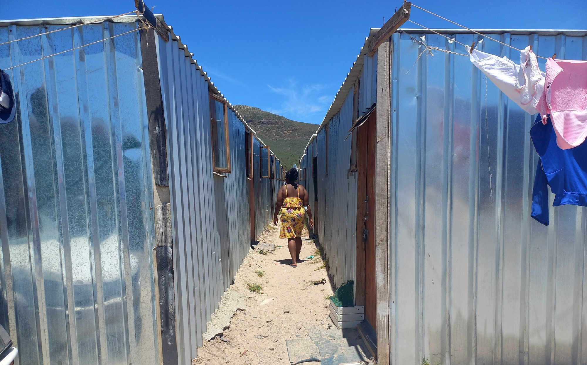 One year on: Displaced families of Masiphumelele blaze becoming impatient over poor temporary accommodation conditions