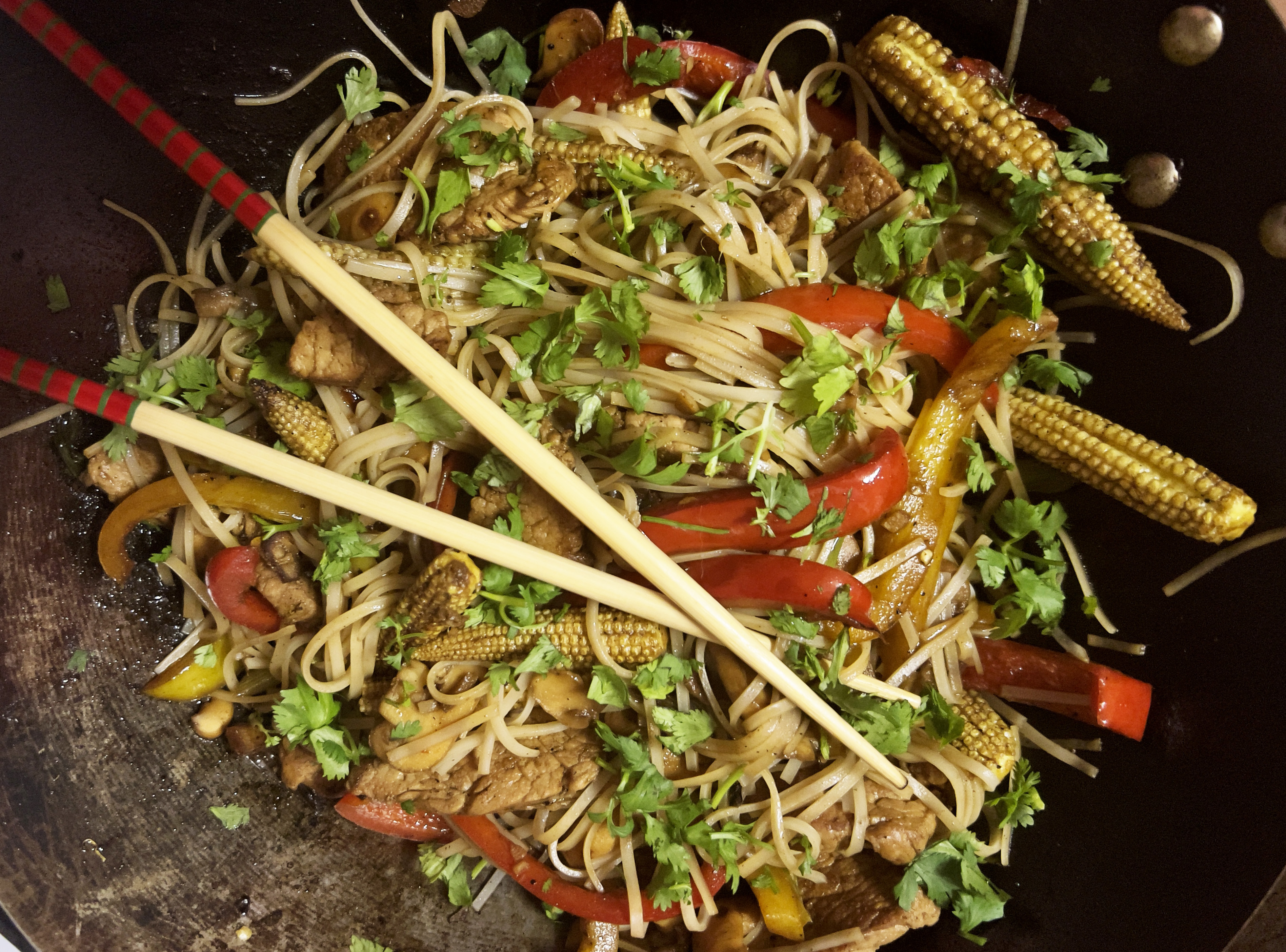 The heat and speed of cooking in a wok