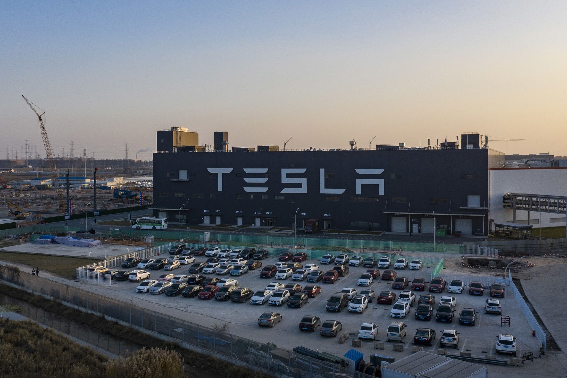 Tesla to Suspend Production at Shanghai Plant on Virus Curbs
