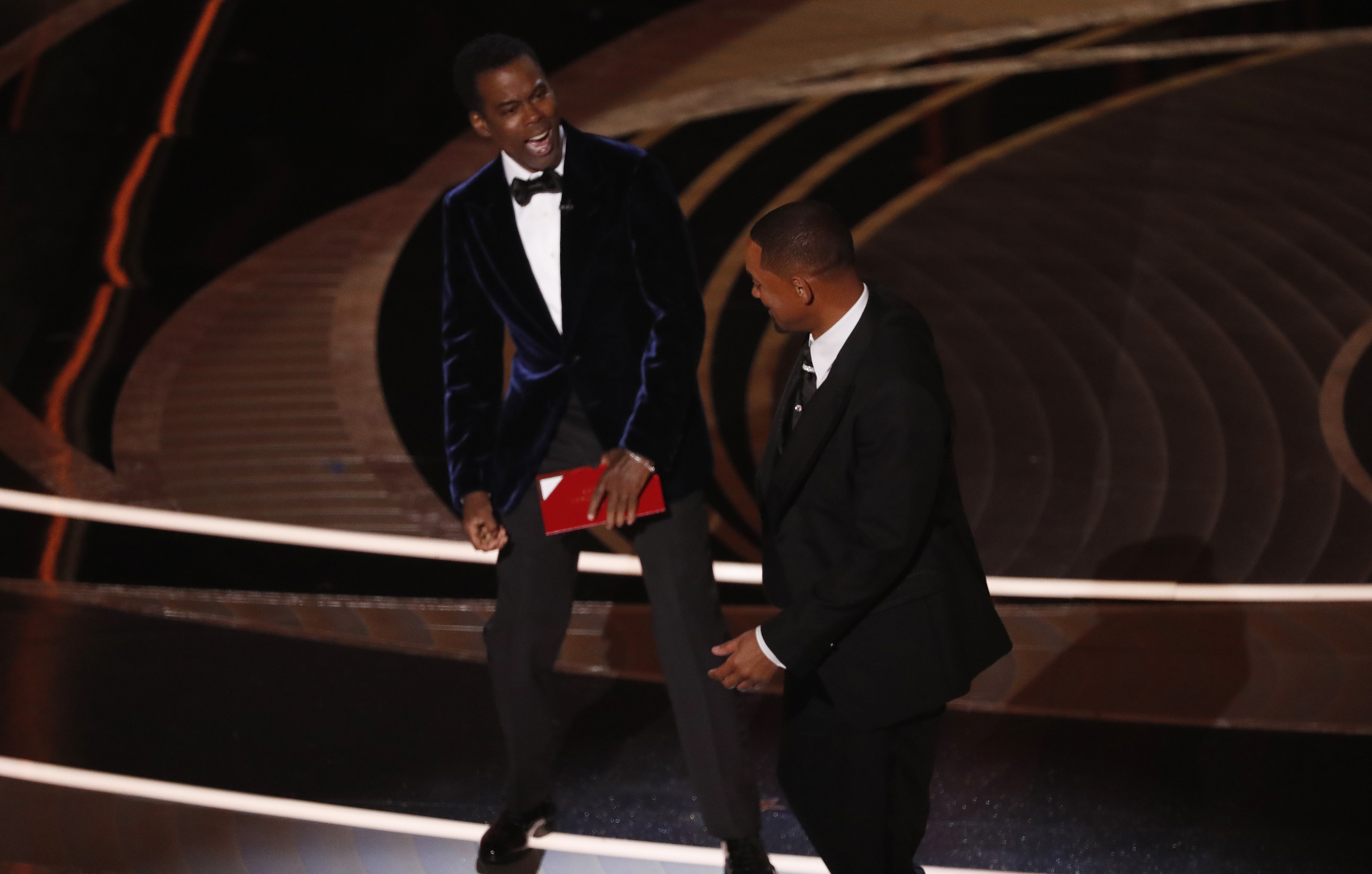 Will Smith smacks Chris Rock on stage at Oscars, drops F-bomb