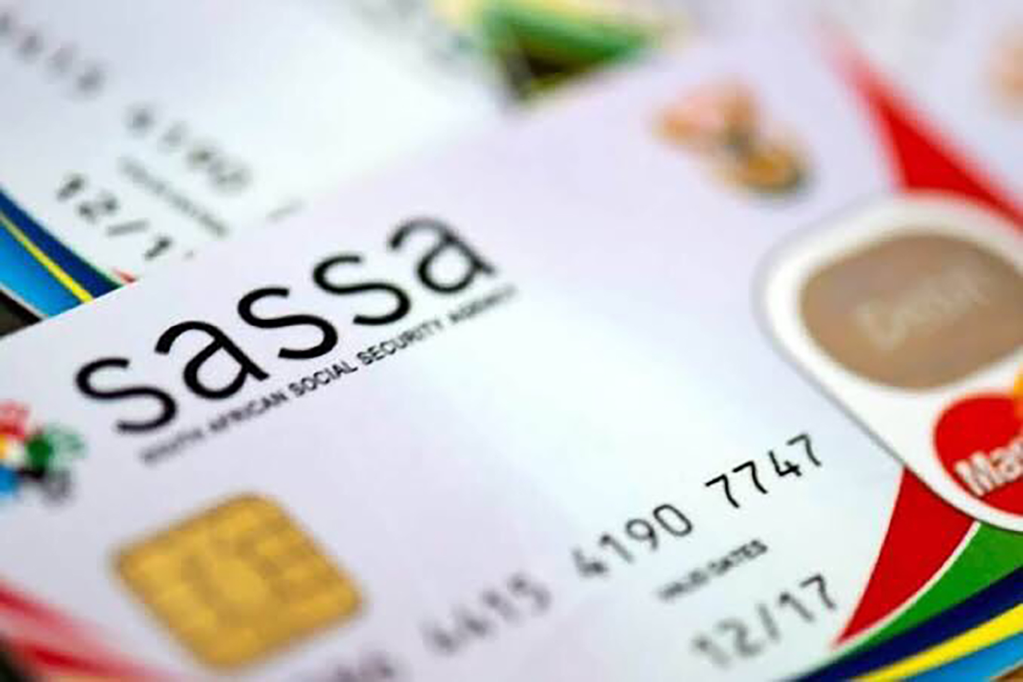 Confusion, long queues and technical problems mar switch to new Sassa card