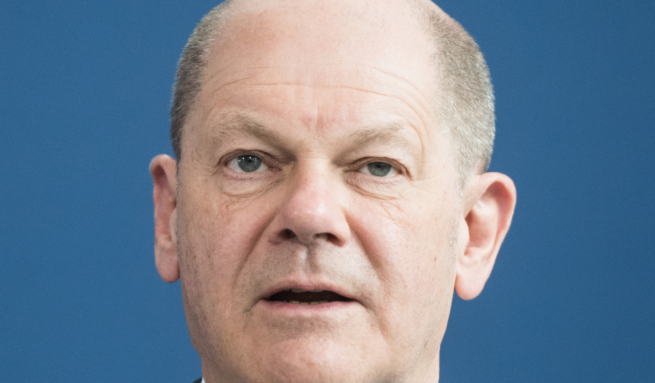 Olaf Scholz’s ‘Zeitenwende’ welcomed by Germans and others, but critics say it doesn’t go far enough