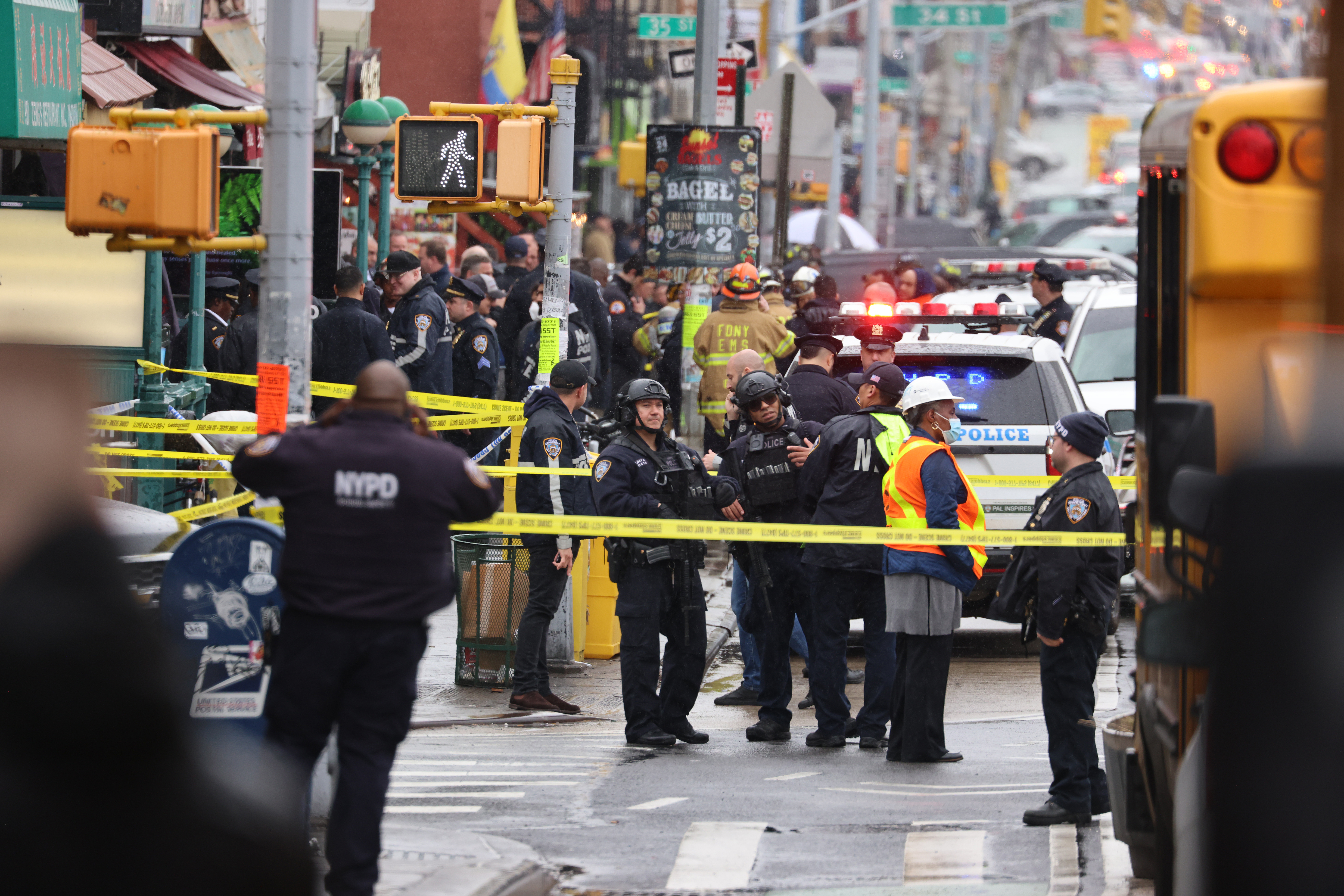 Manhunt under way for gunman in NYC subway shooting that injured at least 23