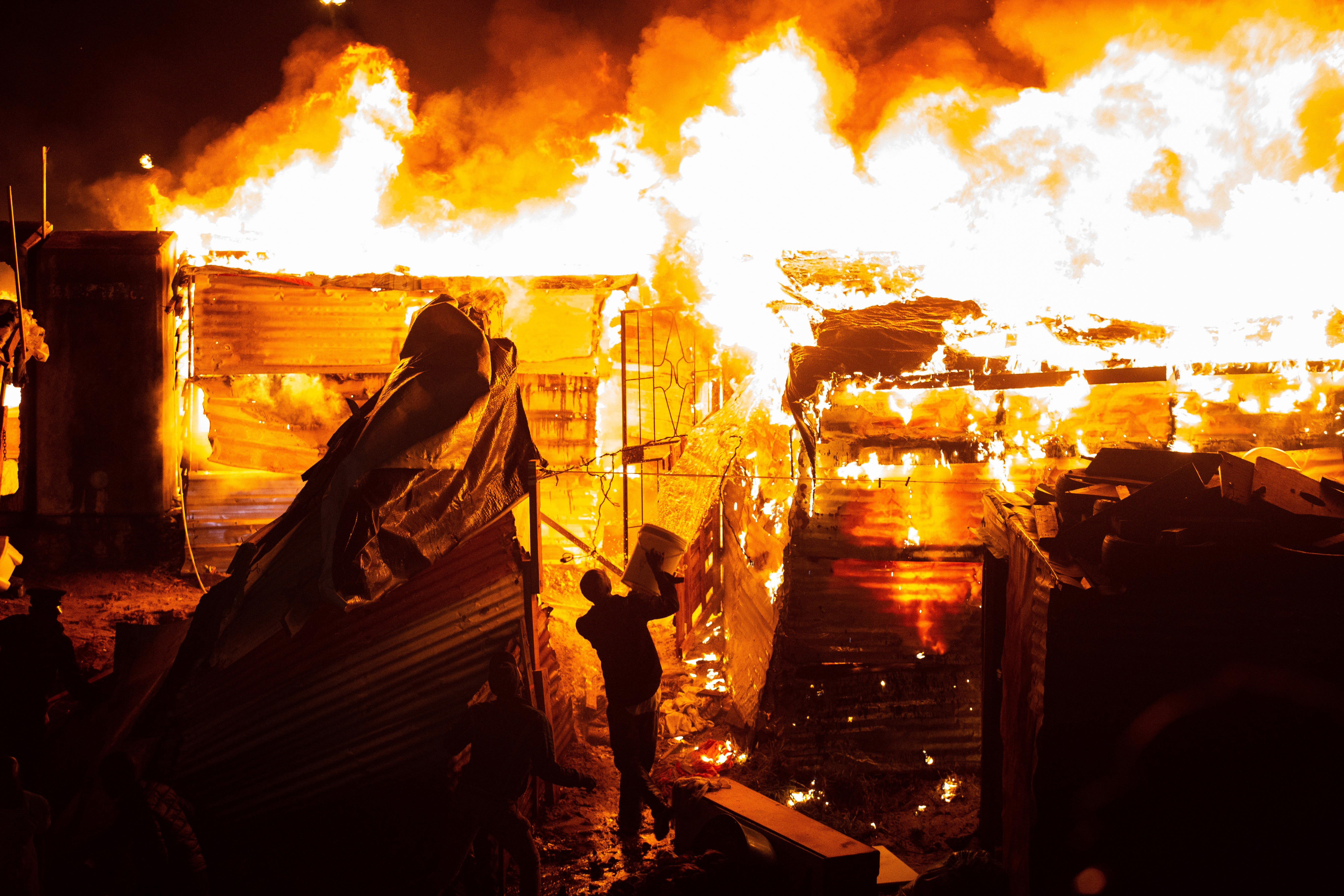 In photos: Large fire destroys Langa homes