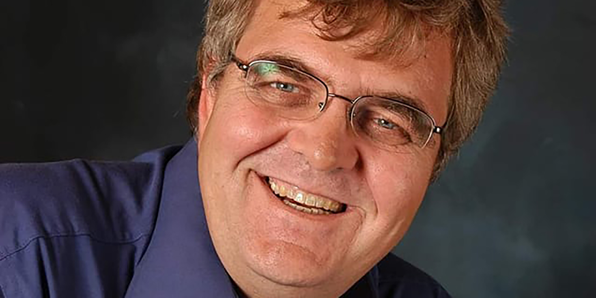 Mike Schussler brought a dose of cheer to the ‘dismal science’ of economics