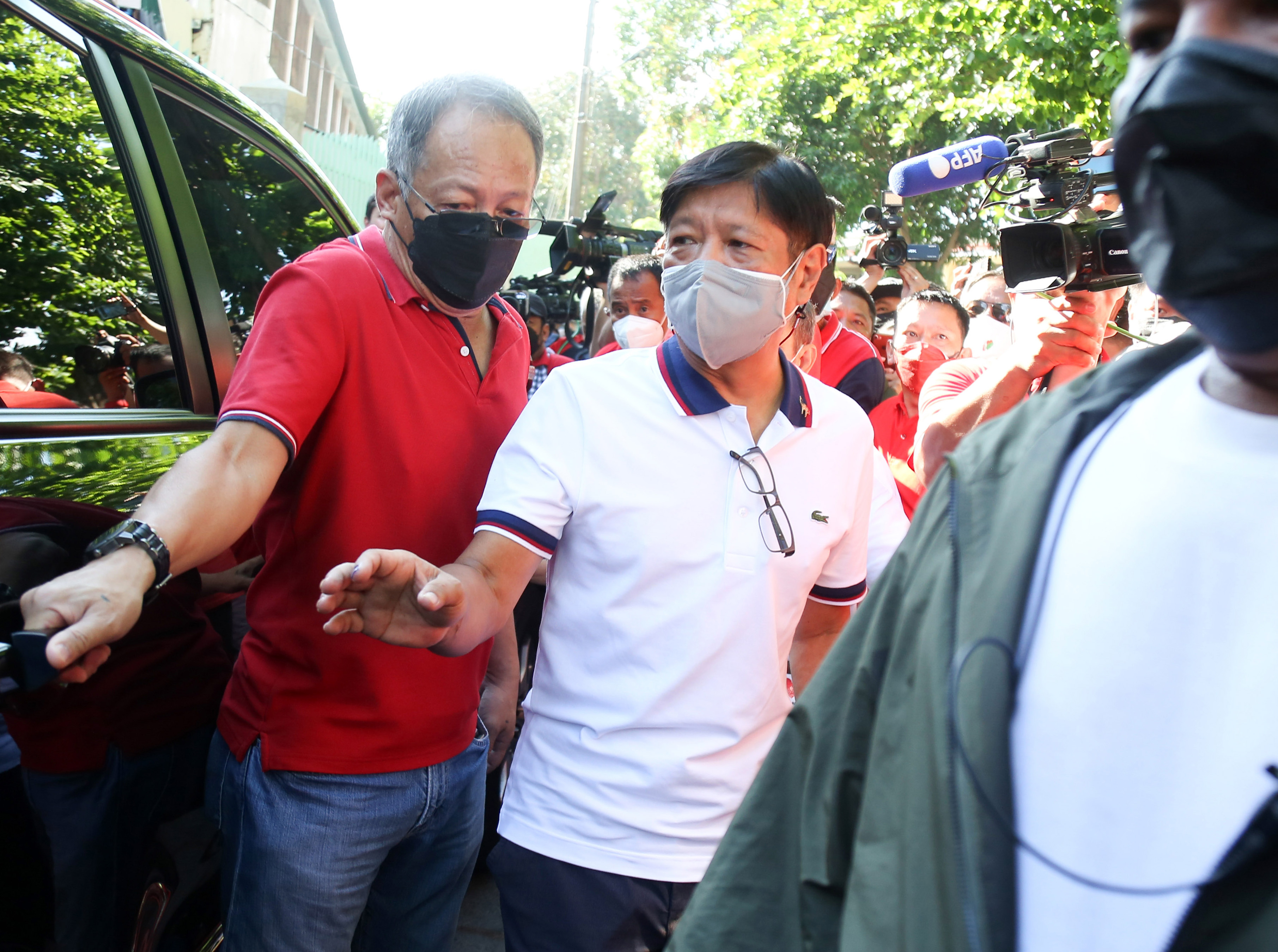 Ferdinand 'Bongbong' Marcos and family cast their votes in Batac