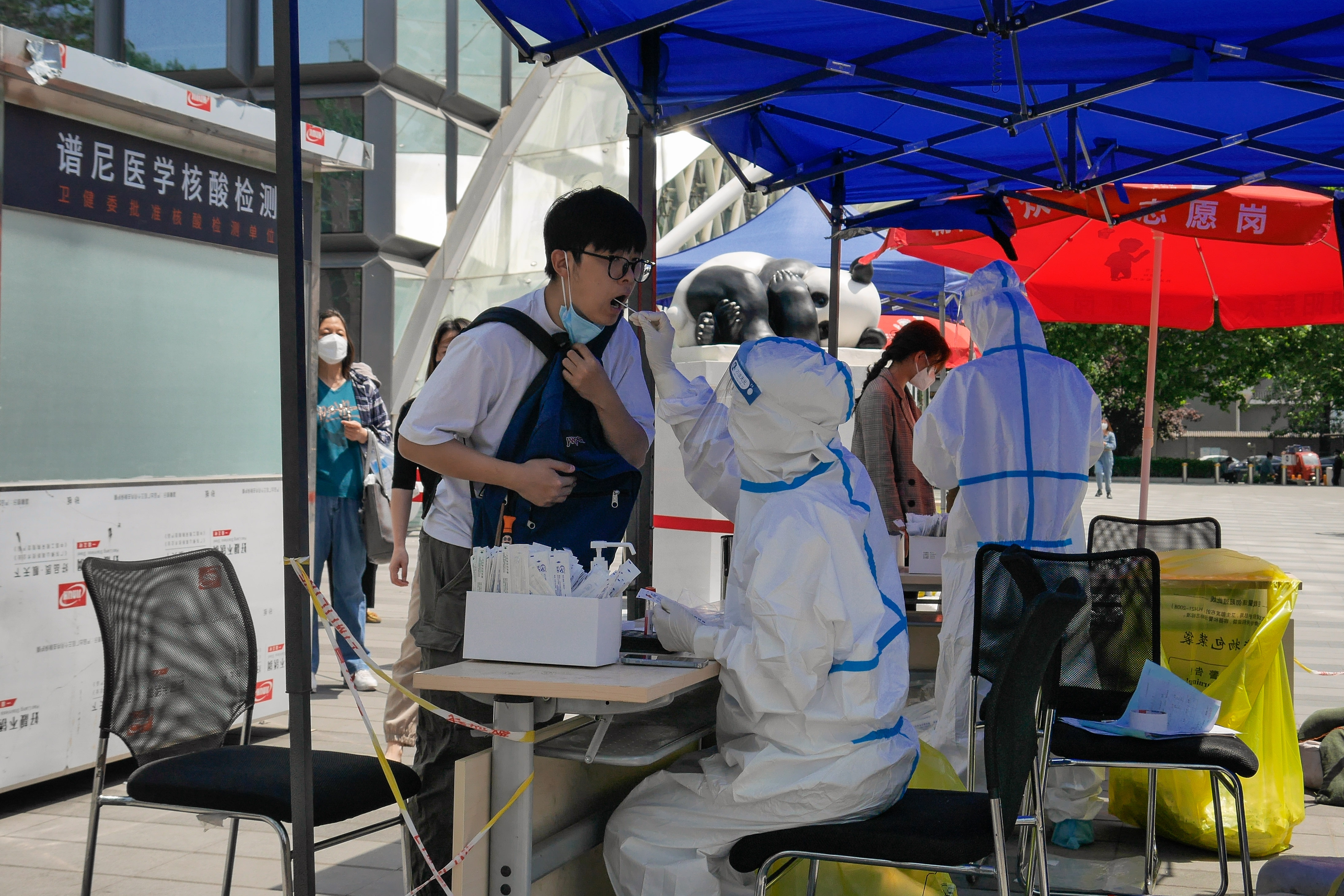 Beijing continues mass testing, Shanghai to relax lockdown in June
