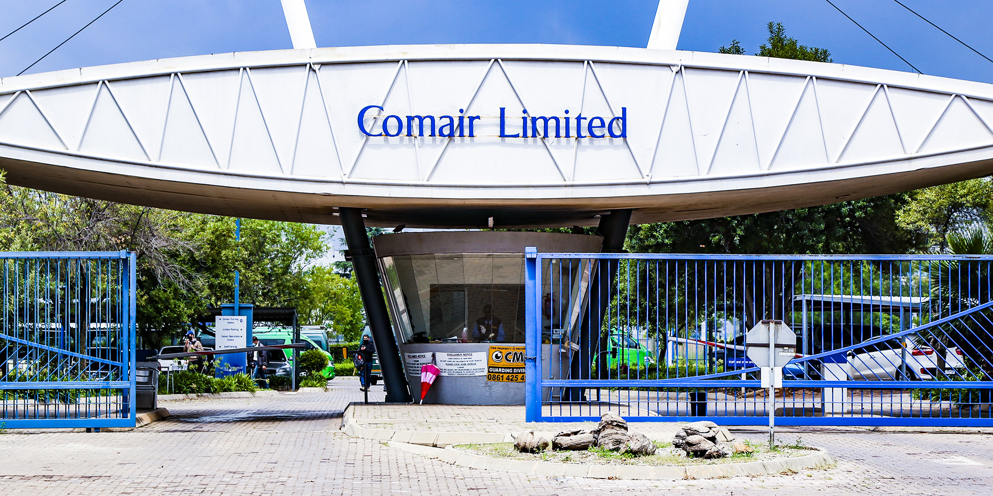Passengers with tickets for Kulula or BA flights are at the back of the Comair liquidation line