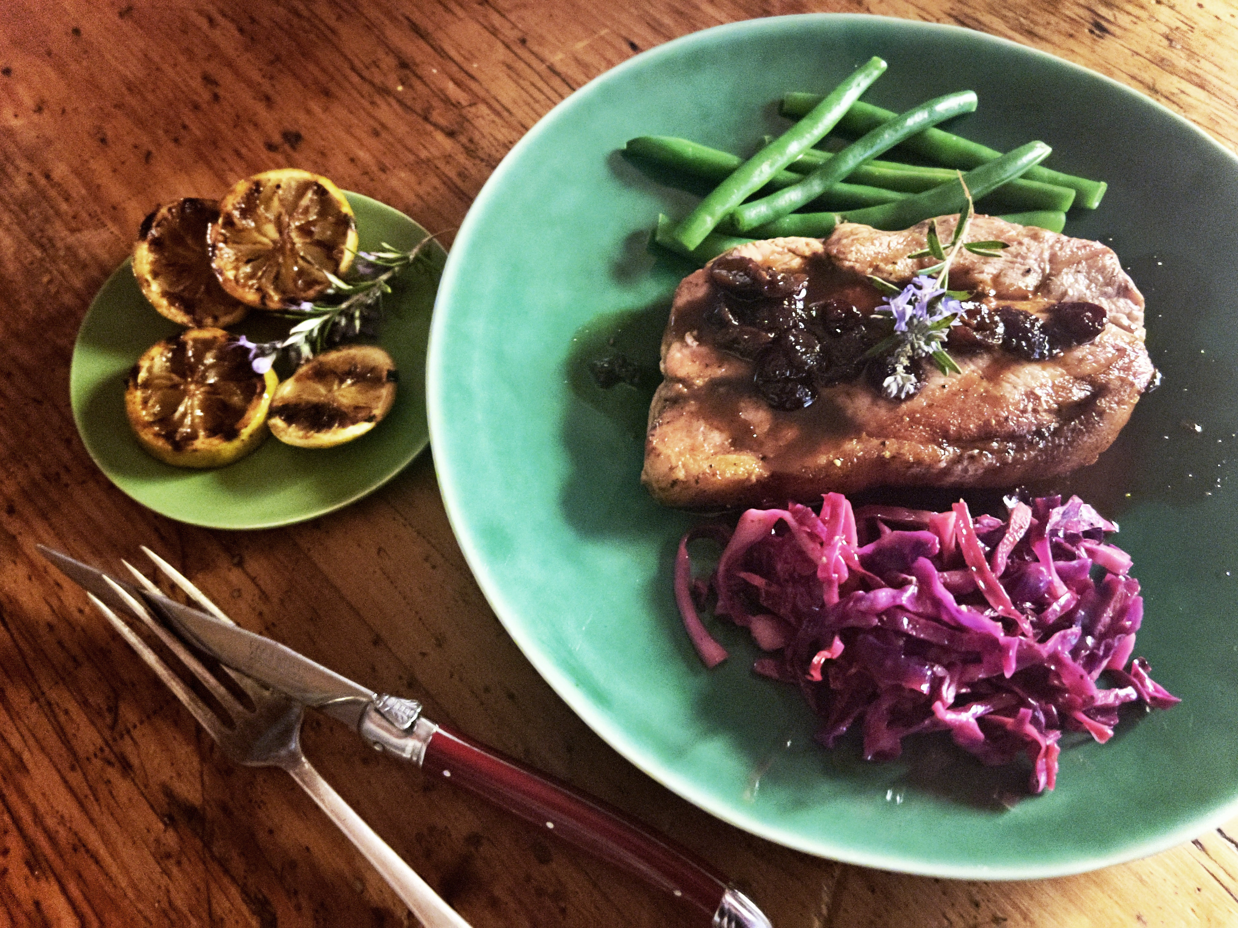 What’s cooking today: Pork rump steaks with cranberry sauce and grilled limes