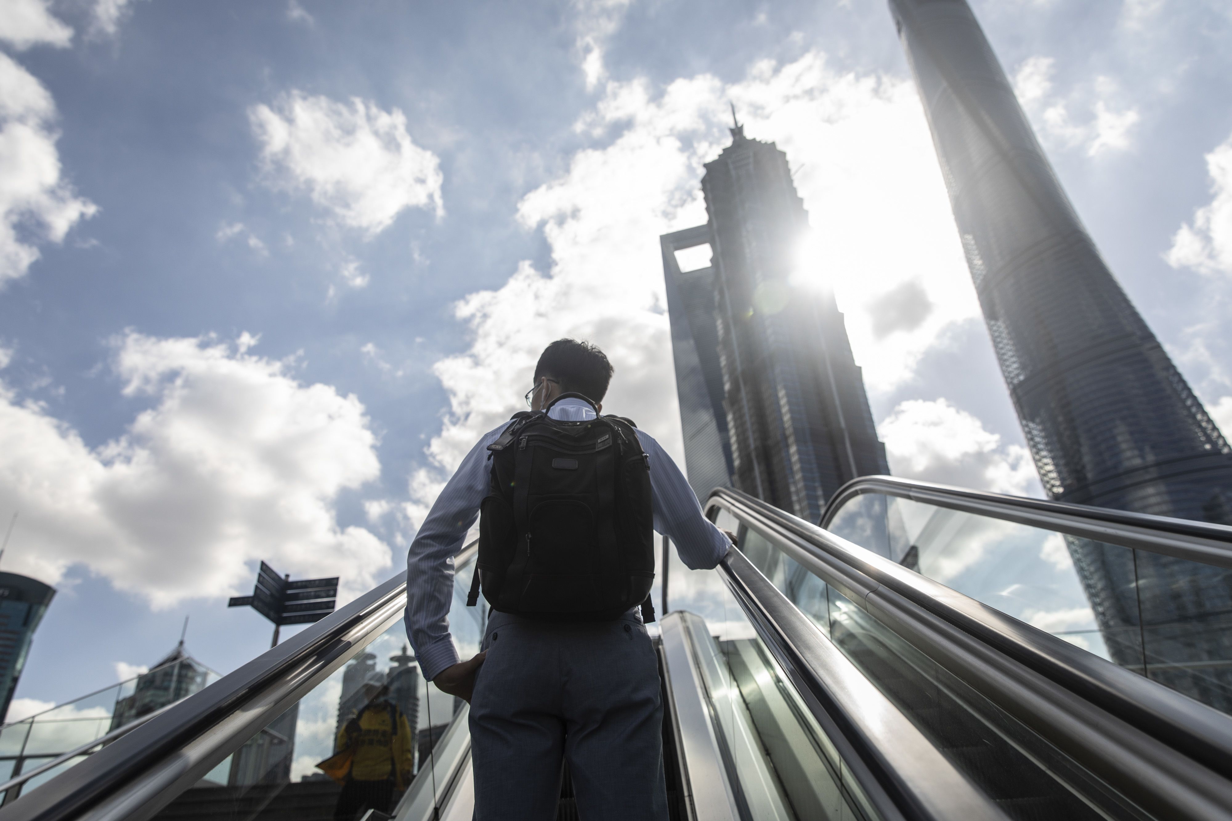 People Return to Work in Shanghai's CBD After Golden Week Holiday