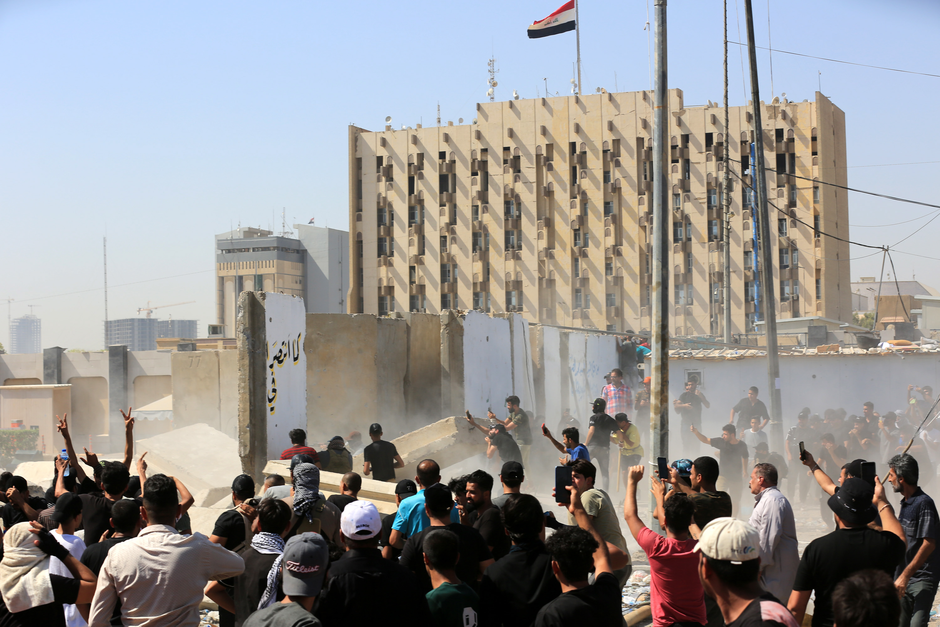 At least 23 dead in Iraq as clashes erupt after Shiite cleric quits politics