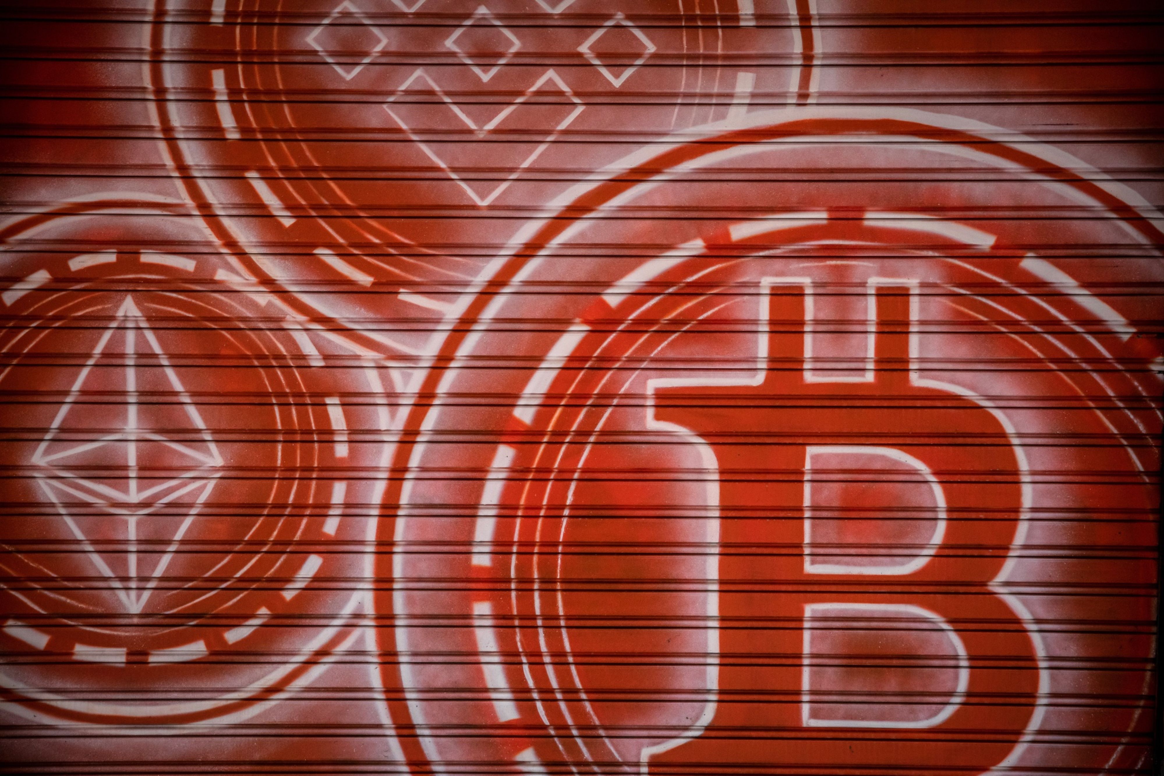 Crypto markets pull back from brink in respite from FTX rout