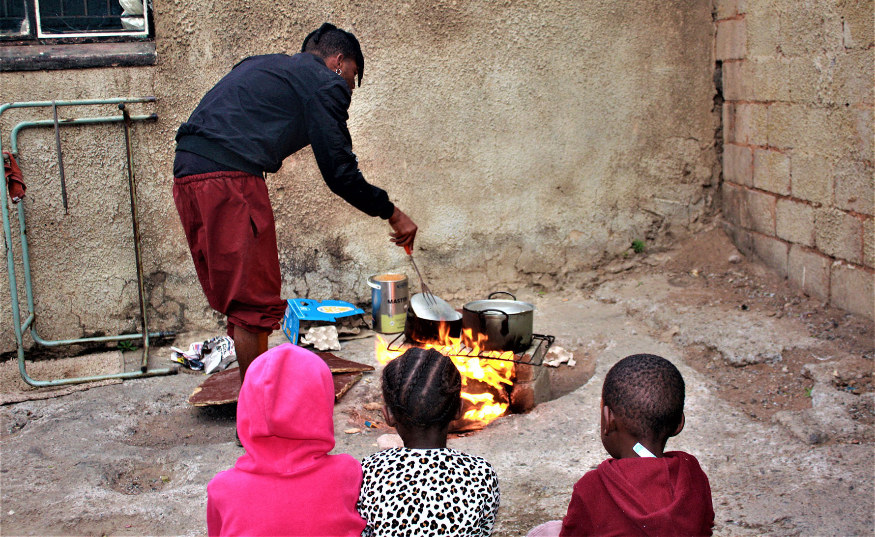 Darkness in Soweto — waiting for water and power to be restored makes a tough life so much harder