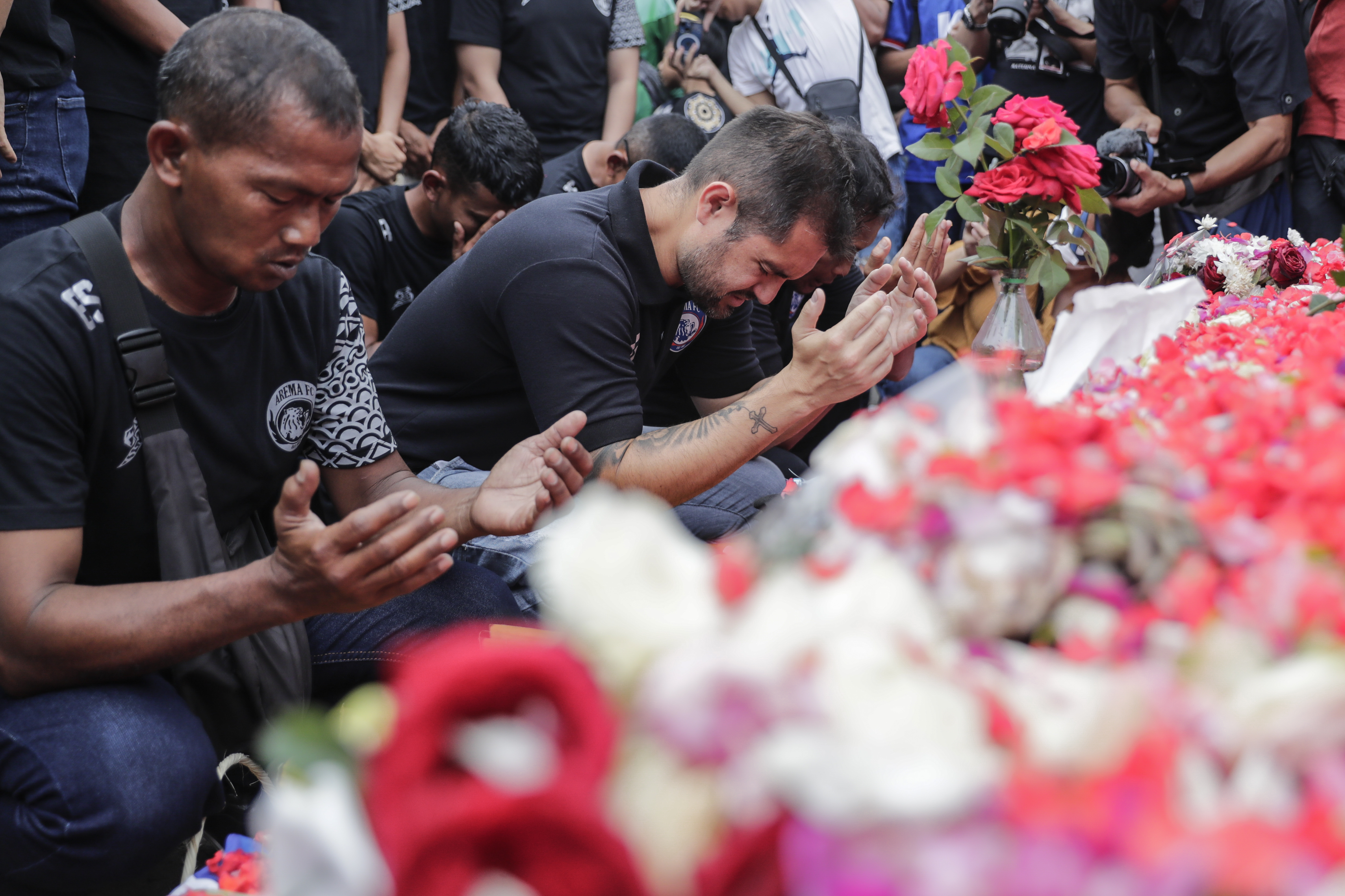 At least 125 people killed during a stampede following a soccer match riot in Malang