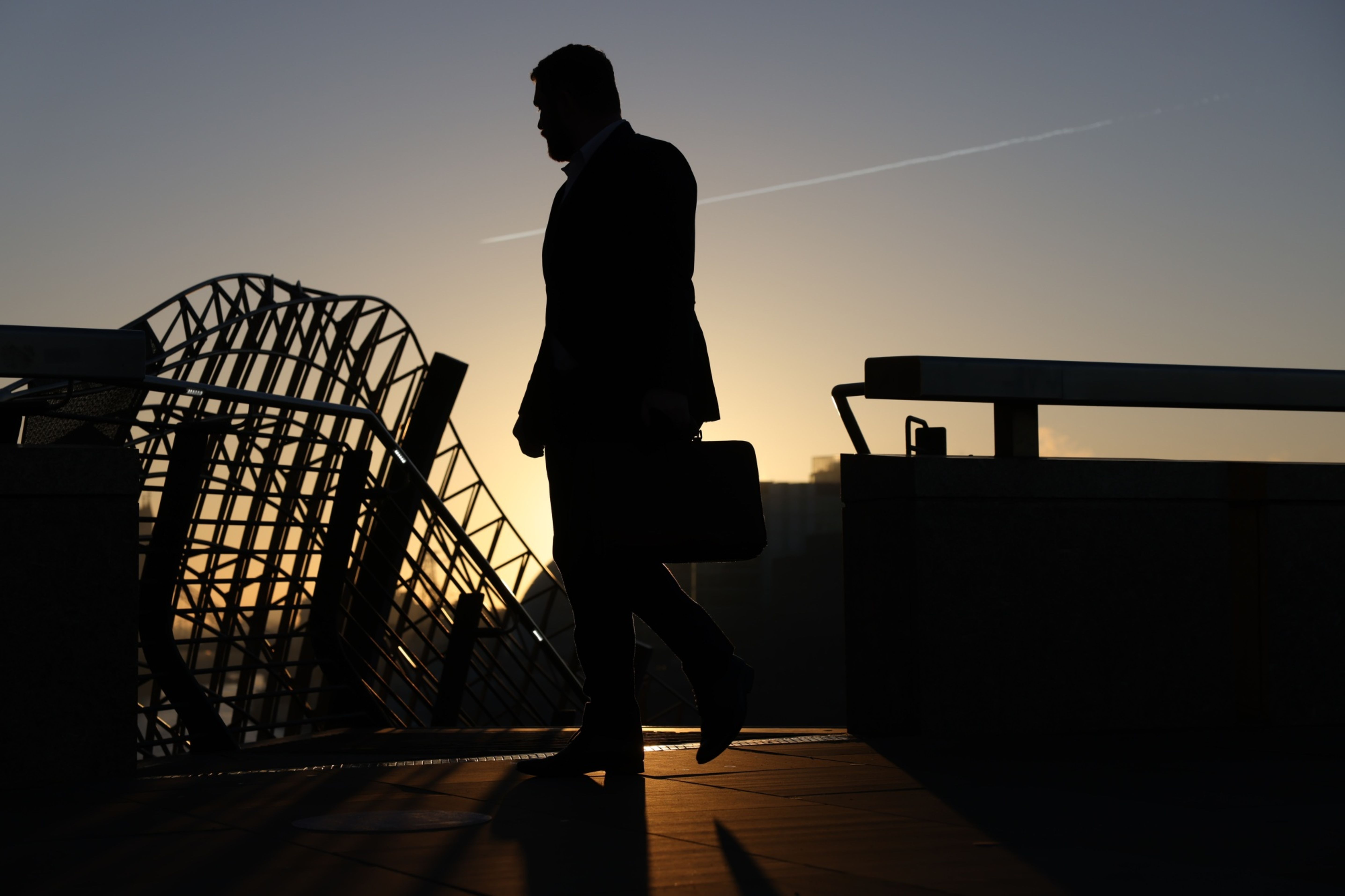 Commuters As U.K. Jobs Market Shrugs Off Omicron