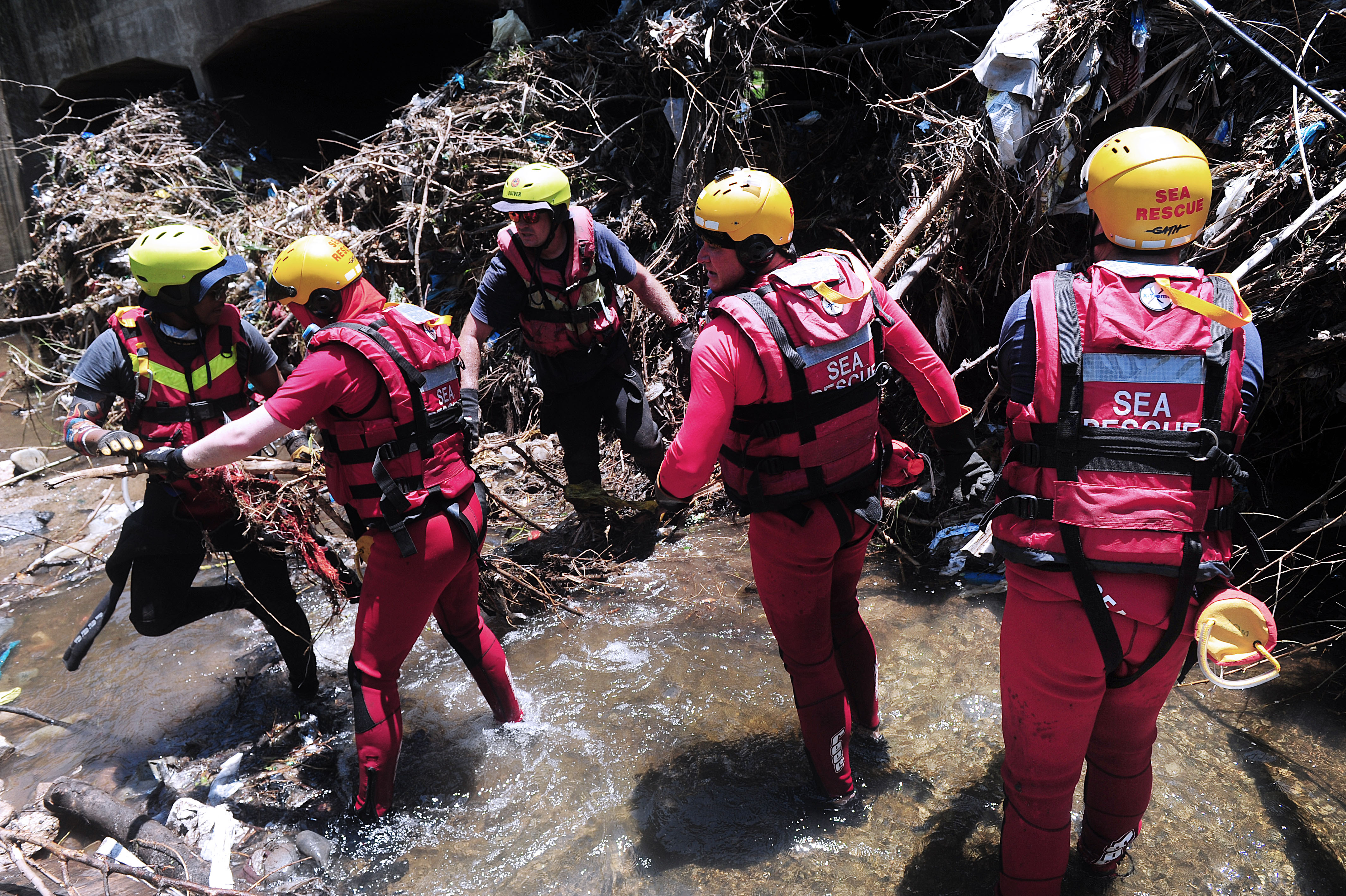 Bad weather stalls search for Alexandra churchgoers believed drowned in flash flood