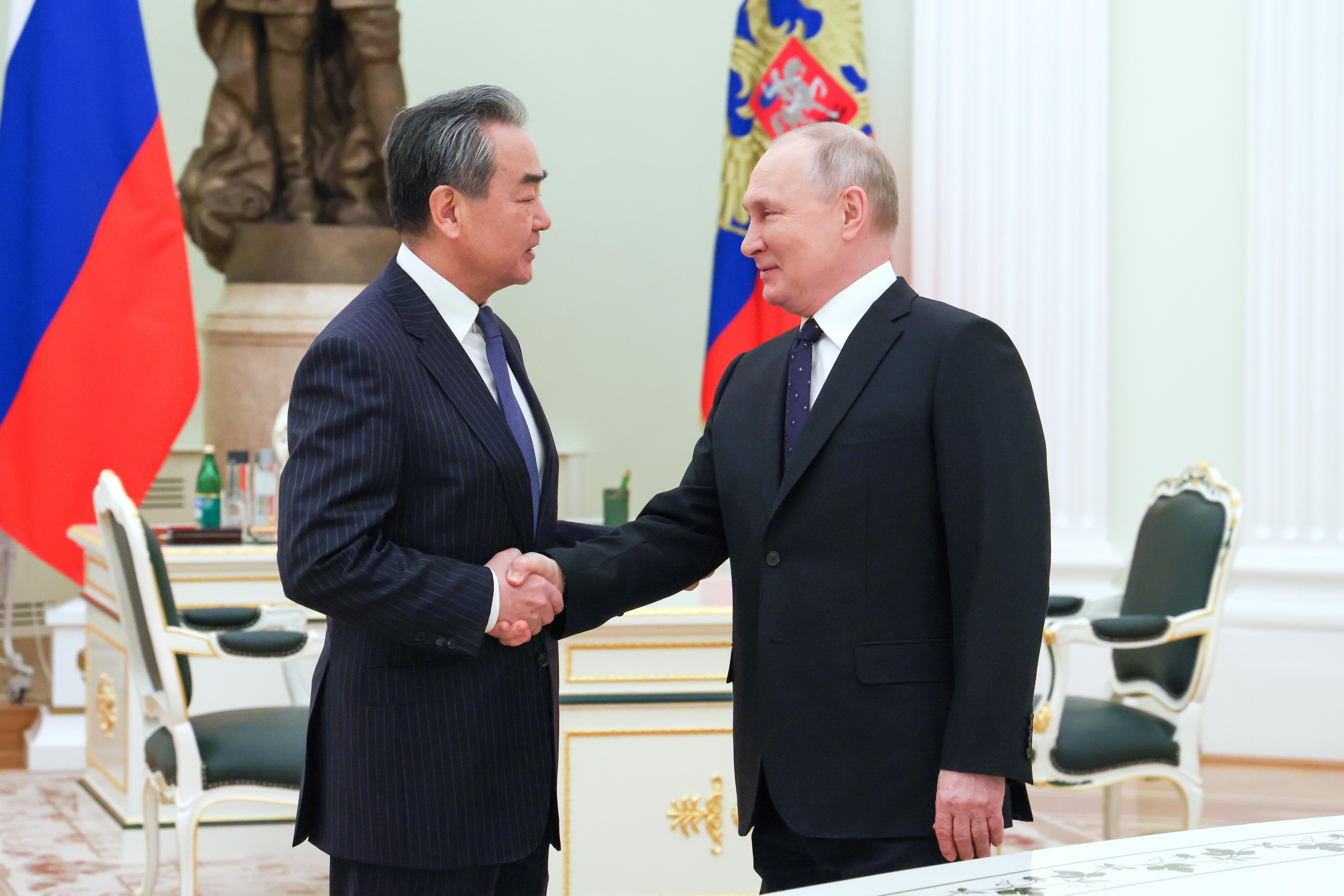Russian President Putin meets China's top diplomat Wang Yi in Moscow