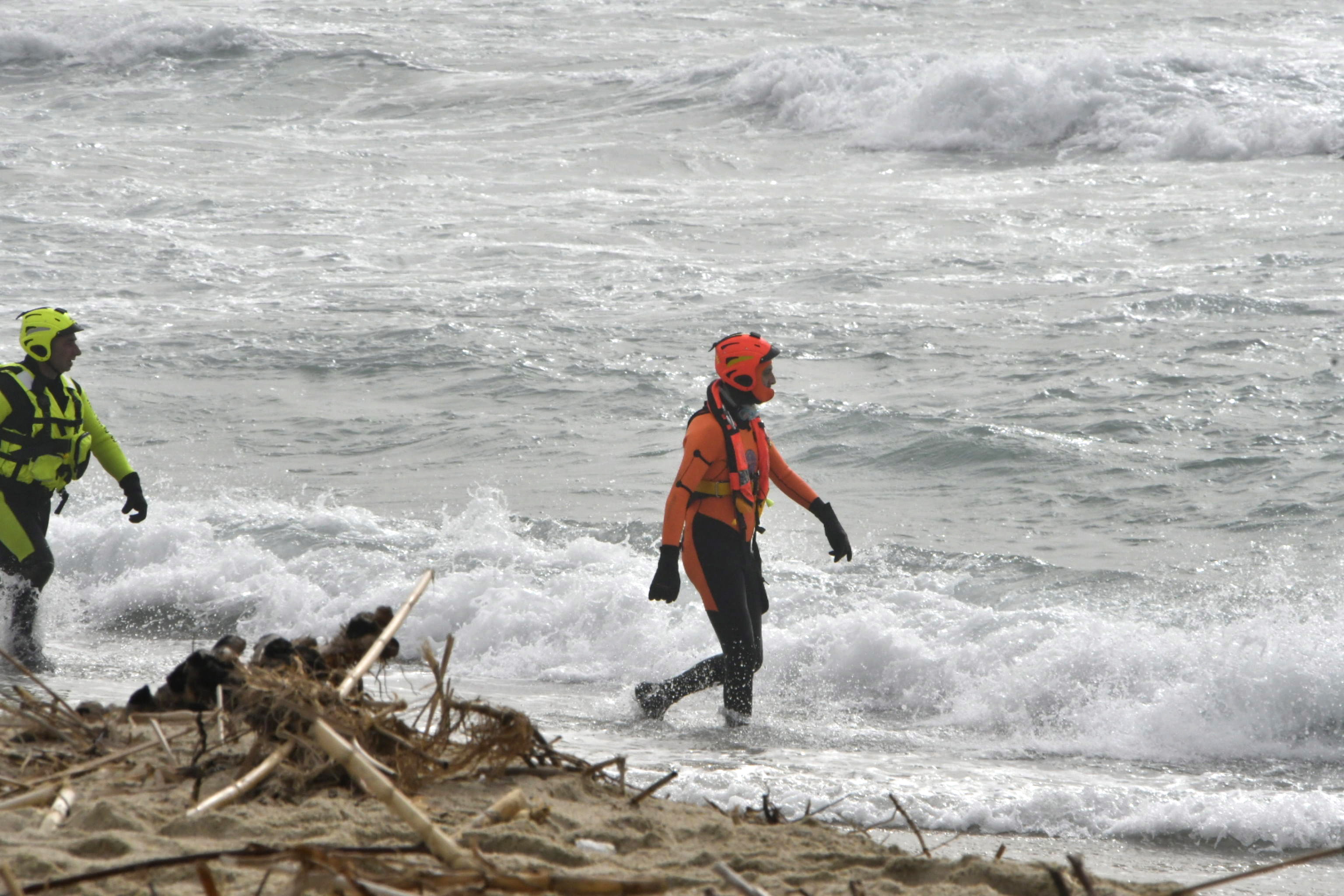 Dozens found dead in southern Italy after migrant boat sinks in rough seas