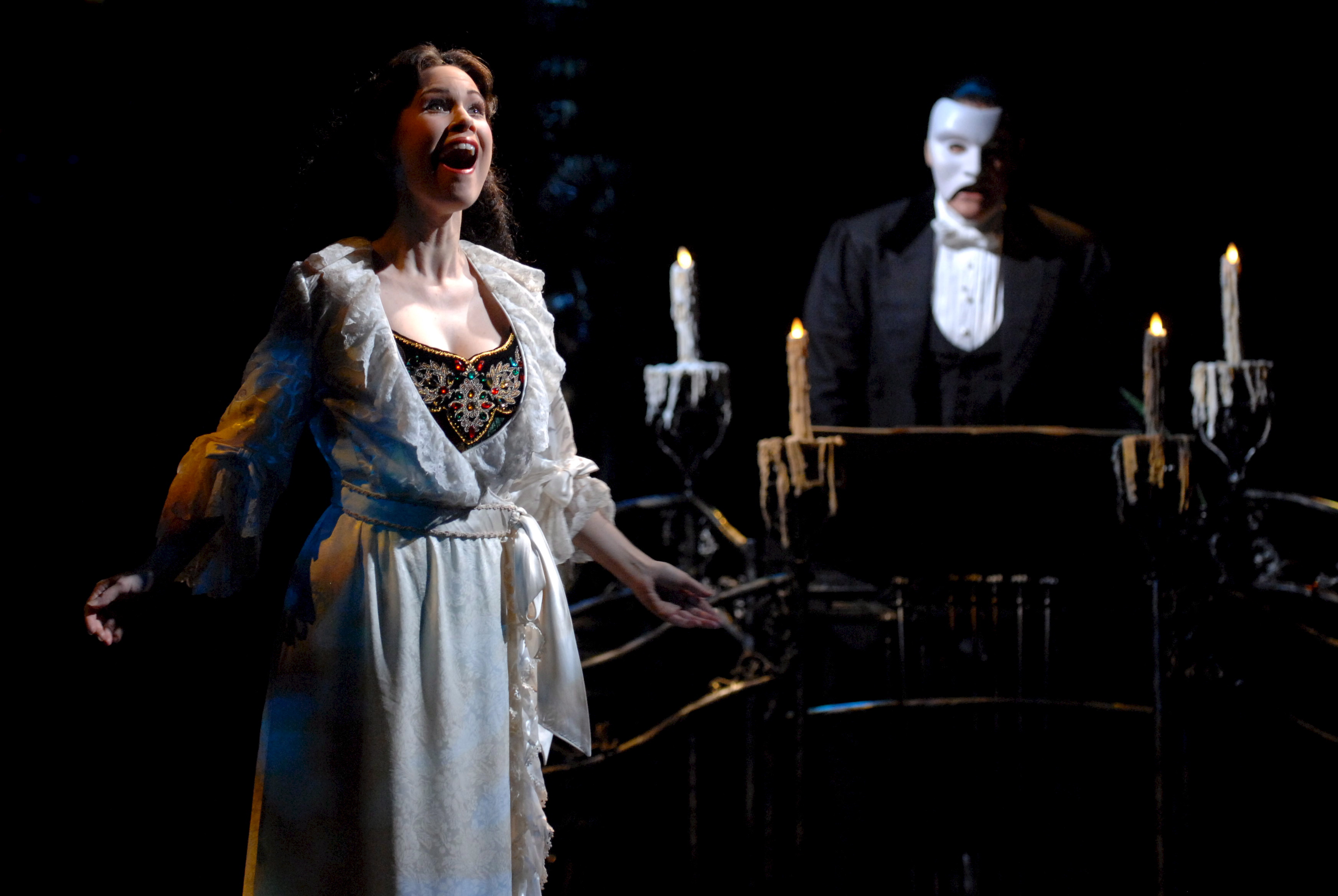 Anthony Warlow (R) and Ana Marina rehearse a scene from the Phantom of the Opera