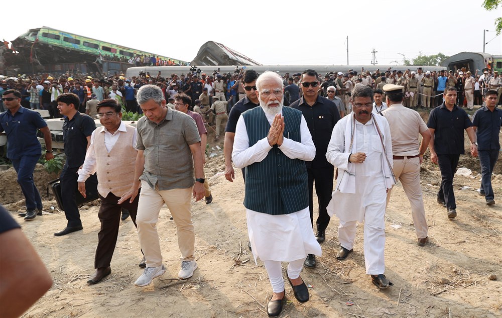 Indian Prime Minister Narendra Modi visits victims of a train accident in Odisha